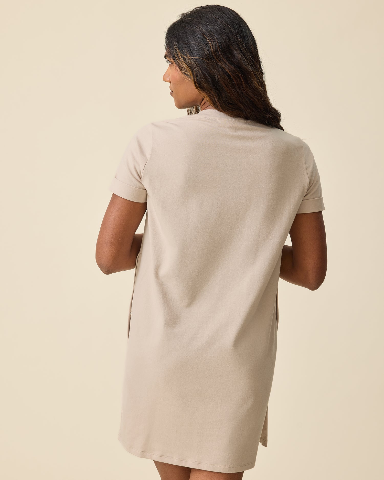 Back of woman wearing the Classic Nursing T-shirt Mini Dress in Sand