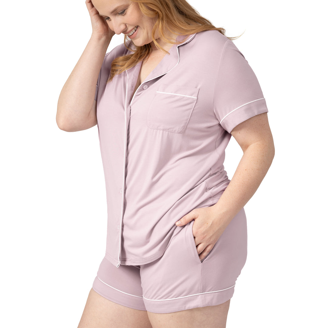 Side view of model wearing the Clea Bamboo Classic Short Sleeve Pajama Set in Lilac, with hand in pocket
