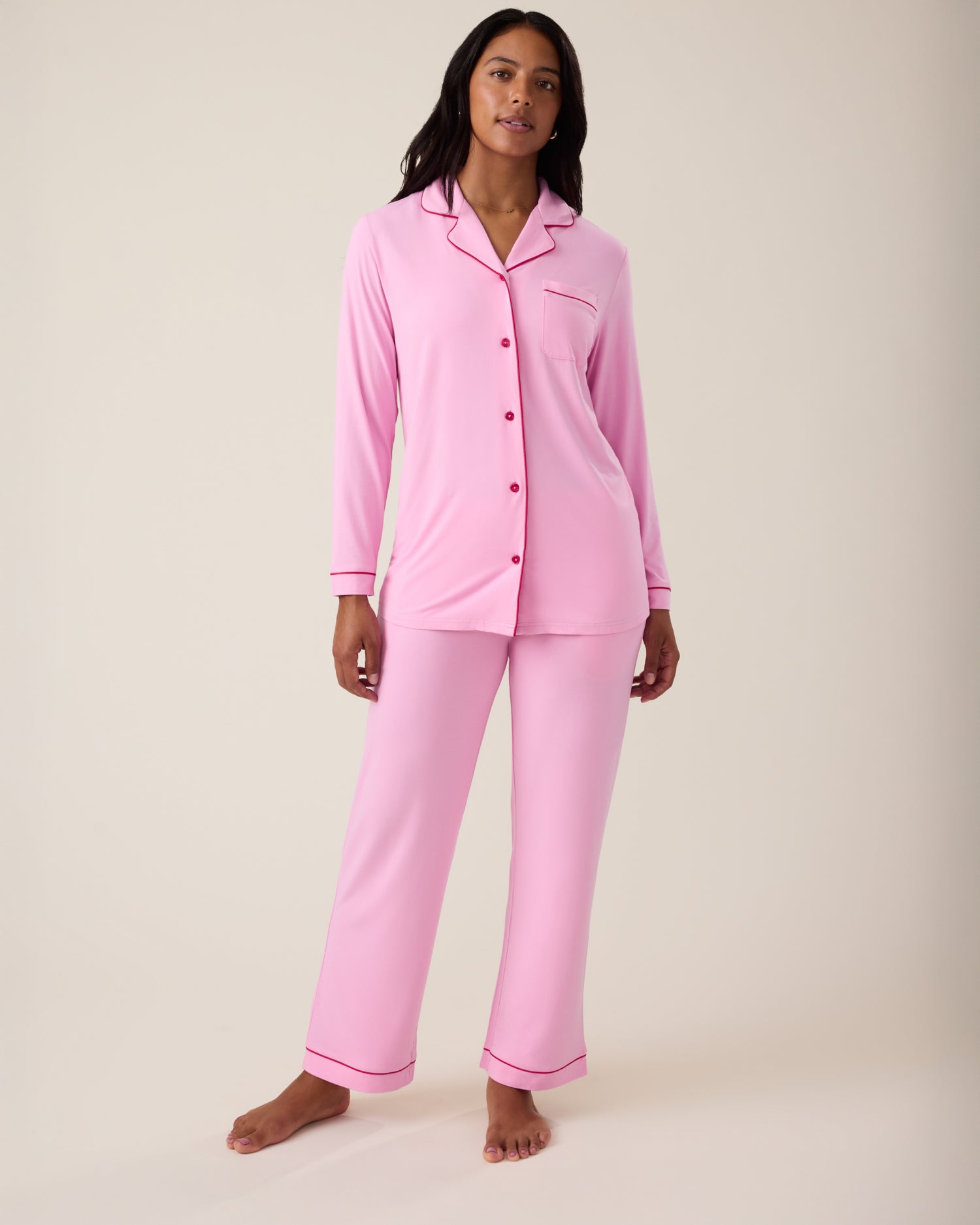 Woman wearing the Clea Bamboo Long Sleeve Pajama Set in Bubblegum@model_info:Nemesis is 5'9" and wearing a Medium.