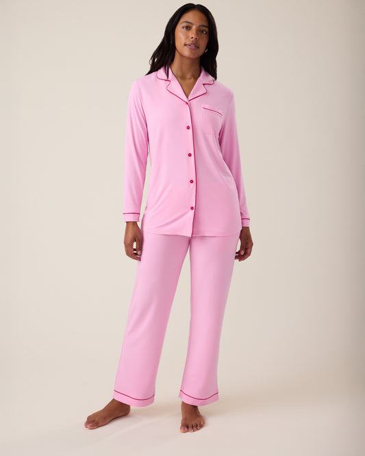 Woman wearing the Clea Bamboo Long Sleeve Pajama Set in Bubblegum@model_info:Nemesis is 5'9" and wearing a Medium.