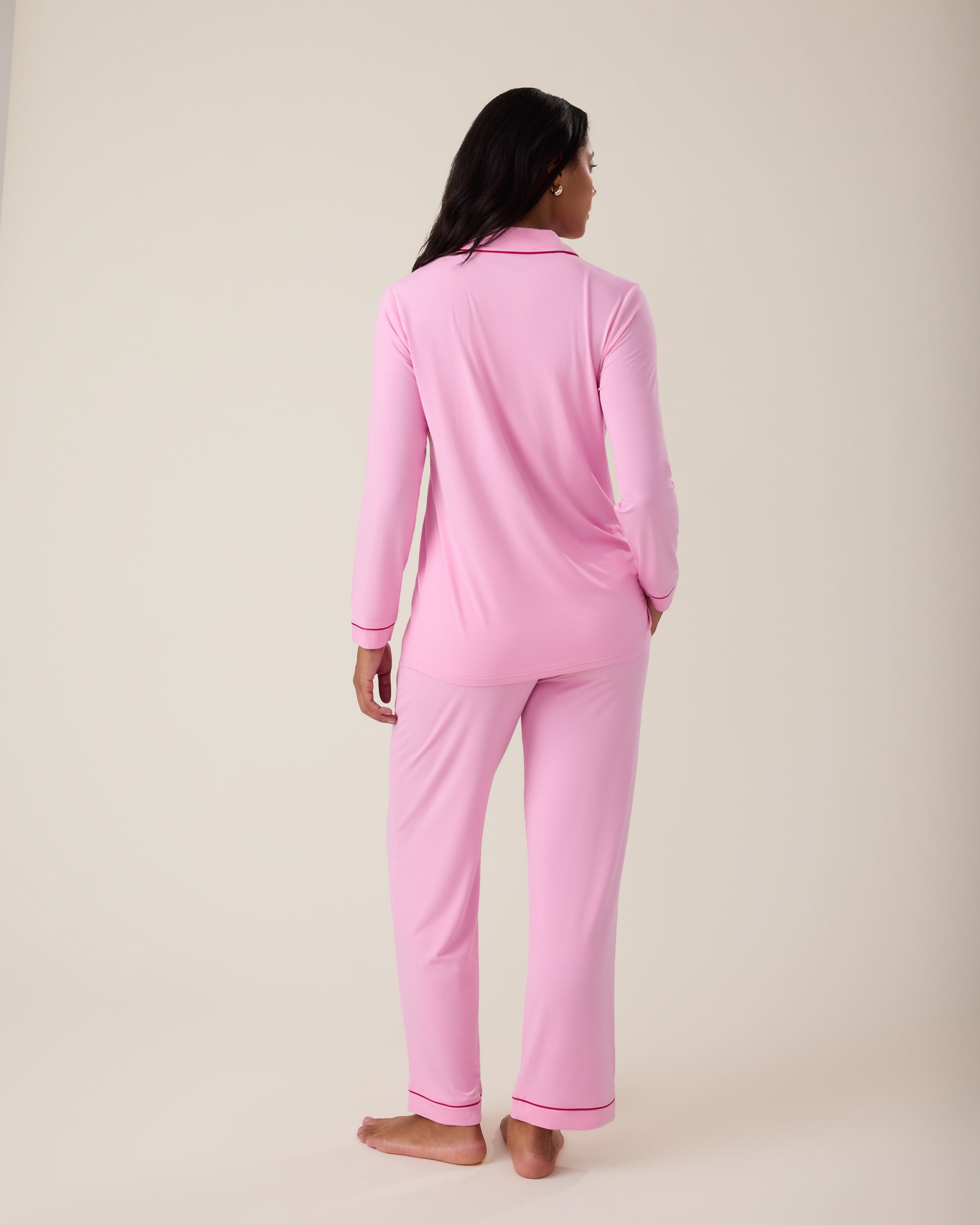 Back of woman wearing the Clea Bamboo Long Sleeve Pajama Set in Bubblegum