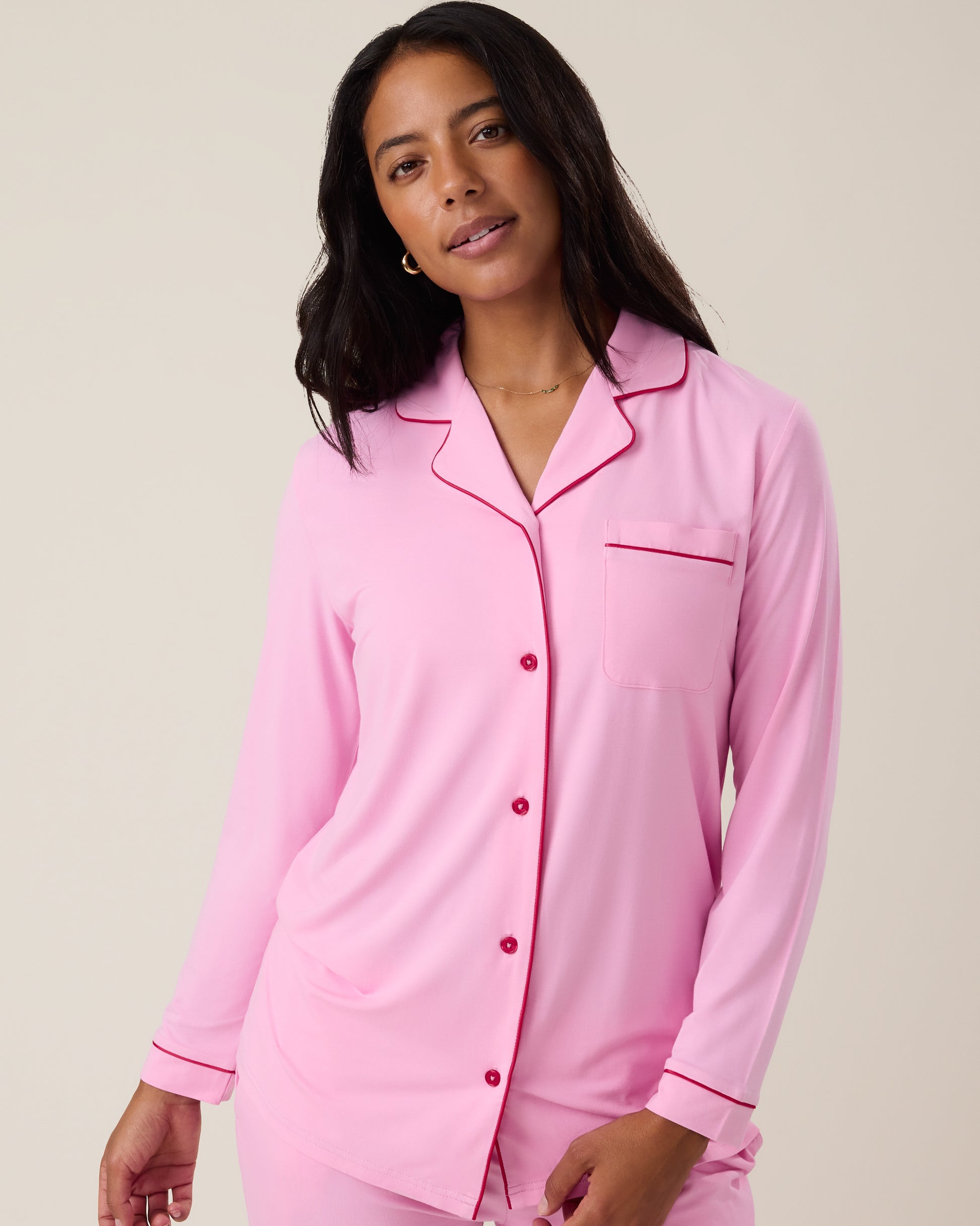 Woman wearing the Clea Bamboo Long Sleeve Pajama Set in Bubblegum
