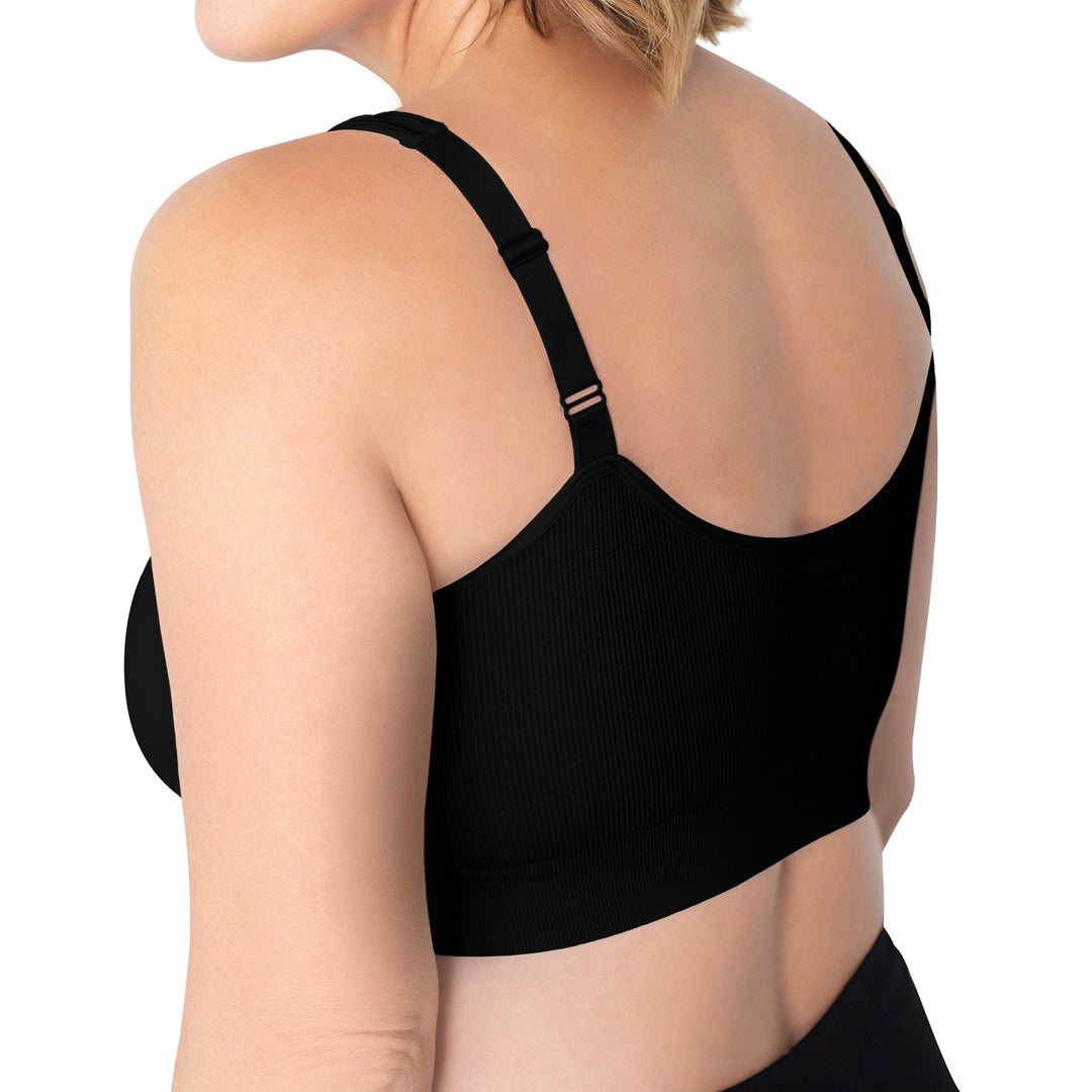 Back of a model wearing the Grace Ribbed Lounge Bra in Black.
