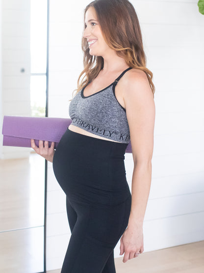 Pregnant model wearing the Sublime® Nursing Sports Bra in heather grey
