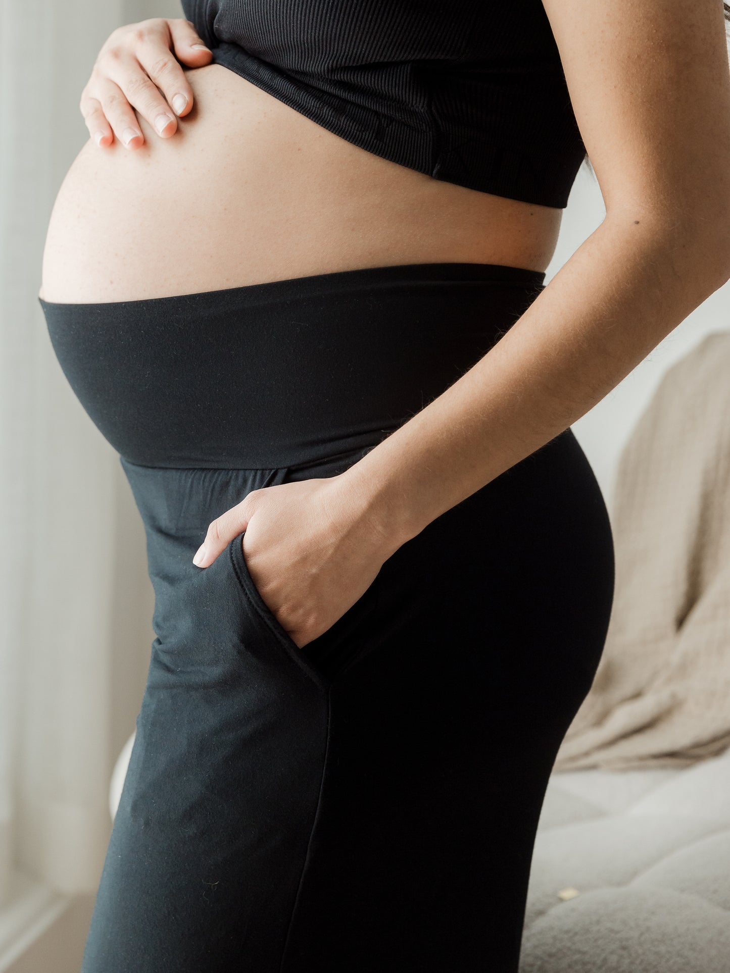 Detail close-up of the Bamboo Wide Leg Maternity & Postpartum Lounge Pant on model with hand in pocket