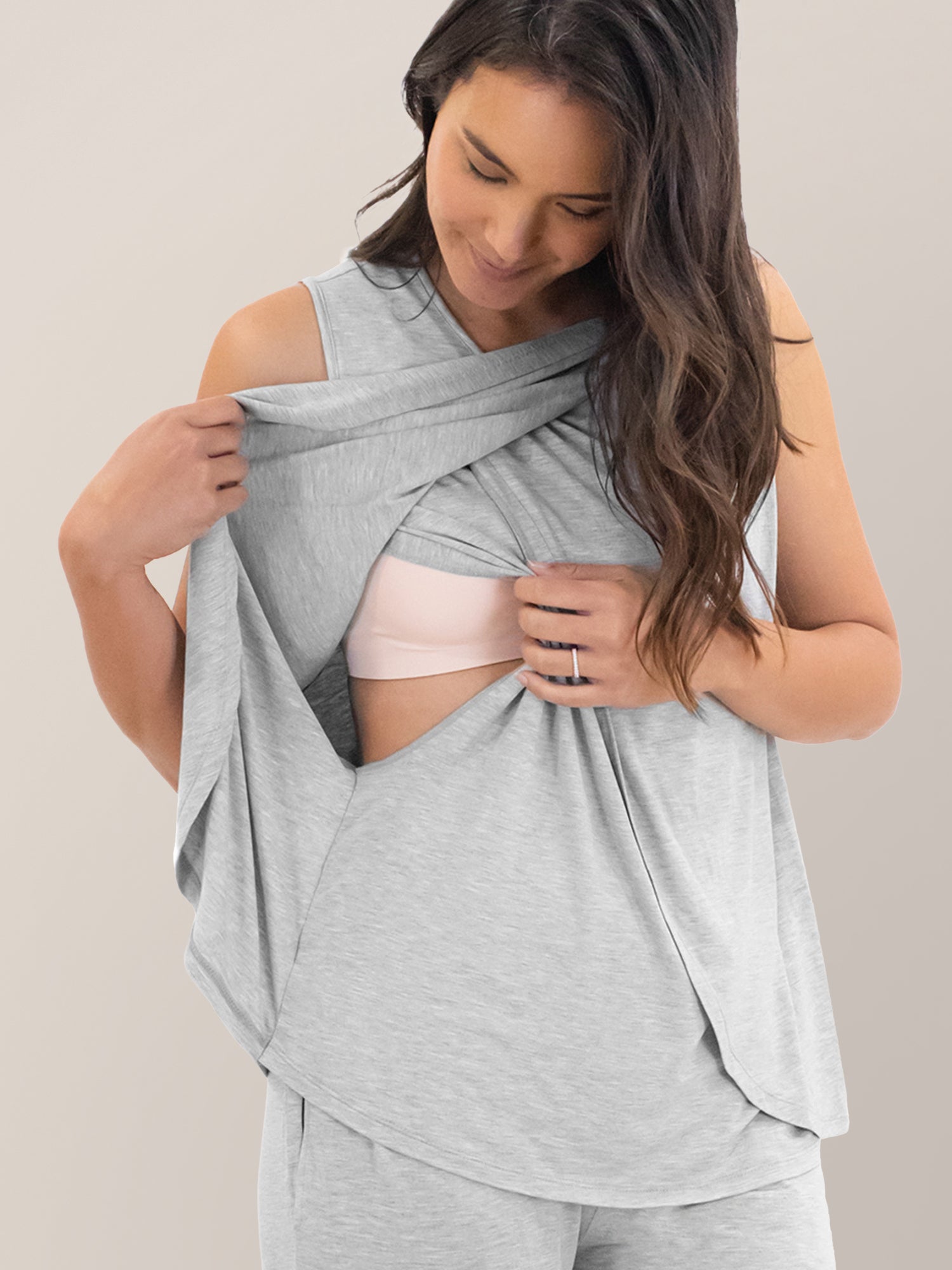 Cropped in view of model wearing the Tulip Hem Nursing Tank & Capri Pajama Set in Grey Heather showing nursing access