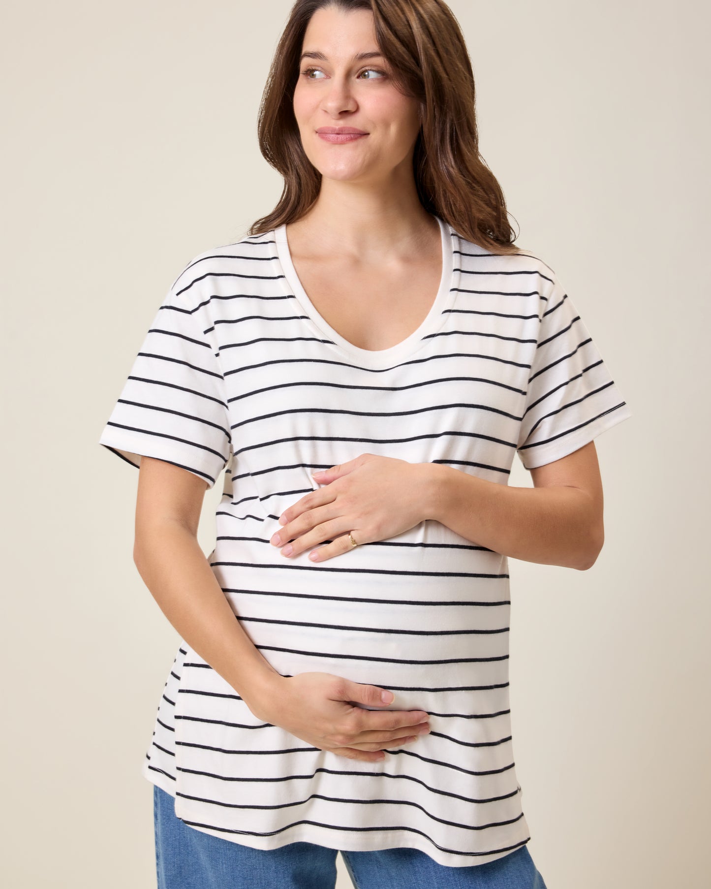 Front view of model wearing Relaxed Cotton Maternity & Nursing T-shirt in White & Black Stripe on a neutral background@model_info:Elliana is wearing a Medium.