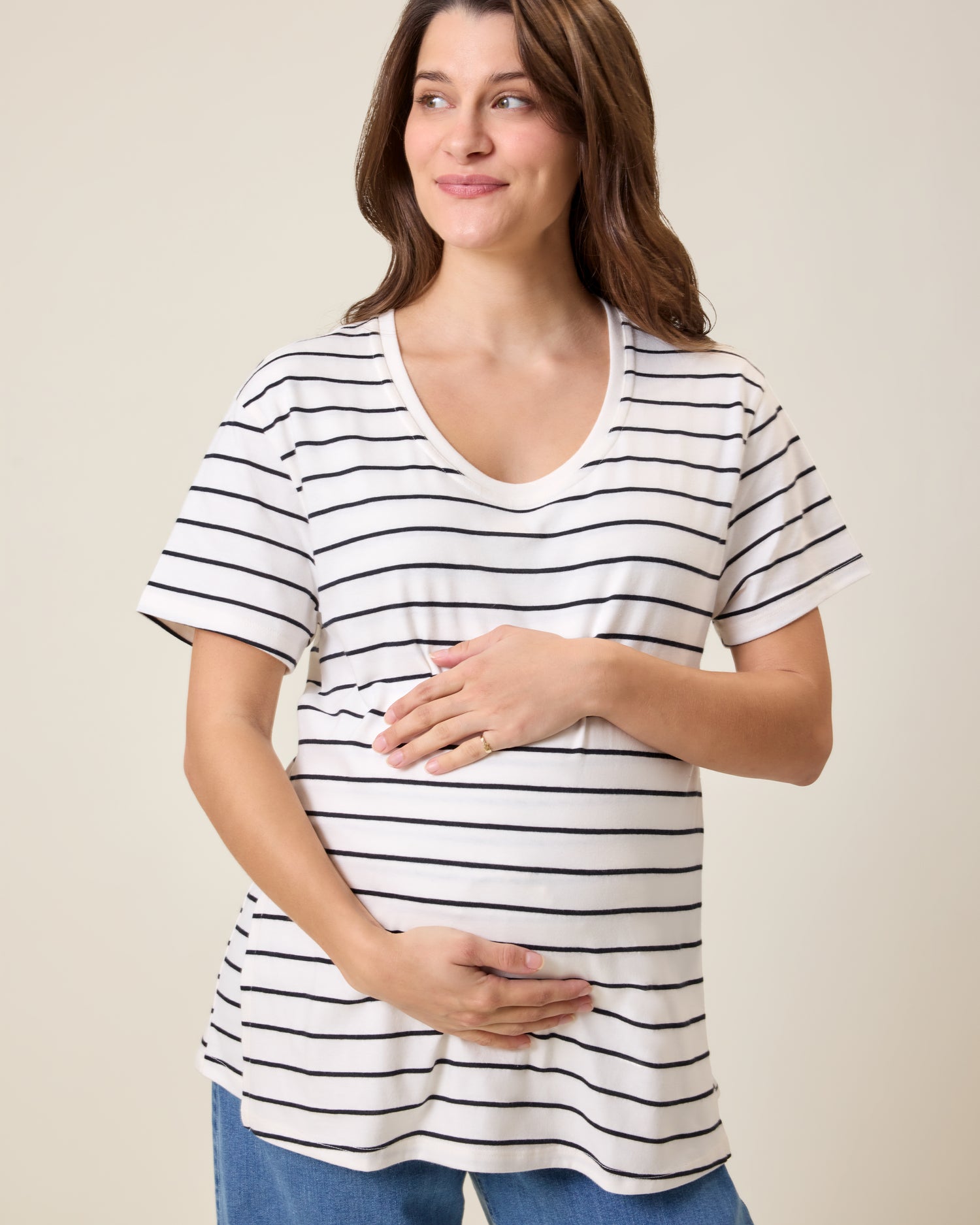 Front view of model wearing Relaxed Cotton Maternity & Nursing T-shirt in White & Black Stripe on a neutral background@model_info:Elliana is wearing a Medium.