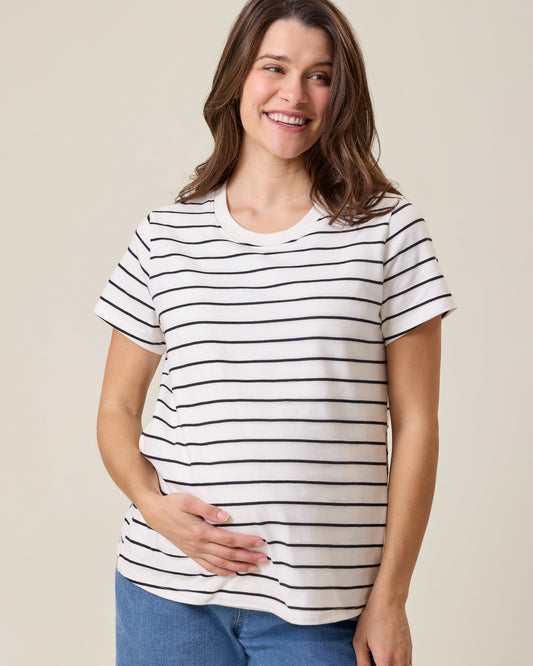 Front view of model wearing Classic Cotton Nursing T-shirt in White & Black Stripe on a neutral background@model_info:Elliana is wearing a Medium.