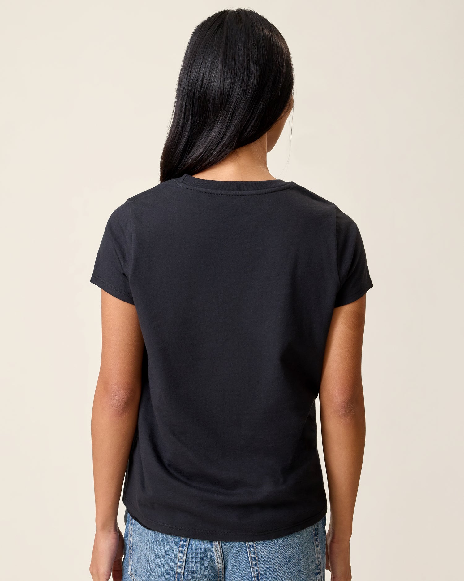 Back view of model wearing Slim Fit Cotton Nursing T-shirt in Black on a neutral background