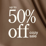 Promotional text 'up to 50% off cozy sale' on a brown background