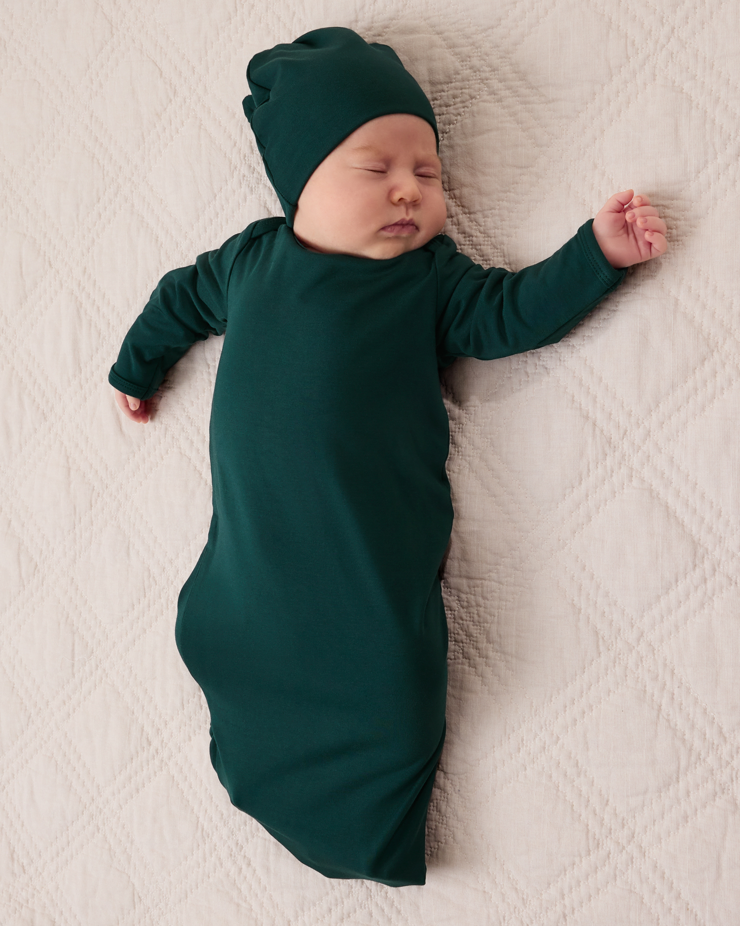 Baby wearing the Cozy Bamboo Baby Gown & Hat in Evergreen @model_info:Liora is 5 weeks old.