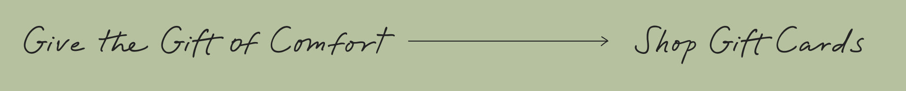 Black letters on green background: The Gift of Comfort > Shop Gift Cards