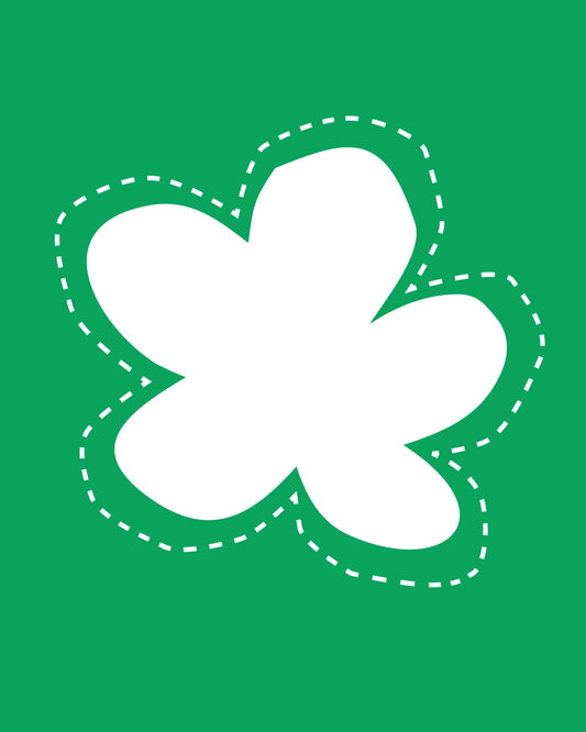 White shape of flower on a green background that represents embroidery.