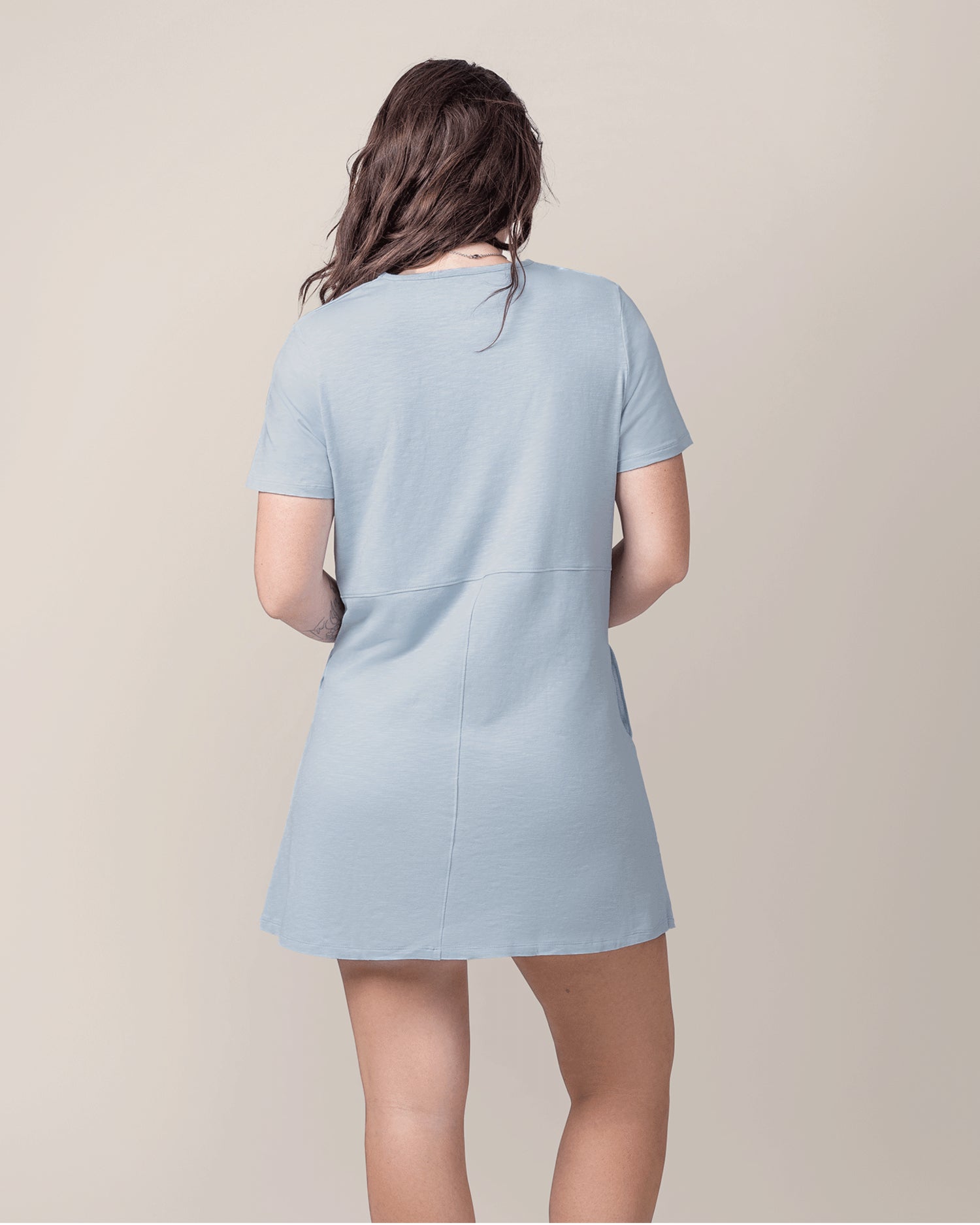 Back view of model wearing the Emmie Nursing T-shirt Dress in French Blue 