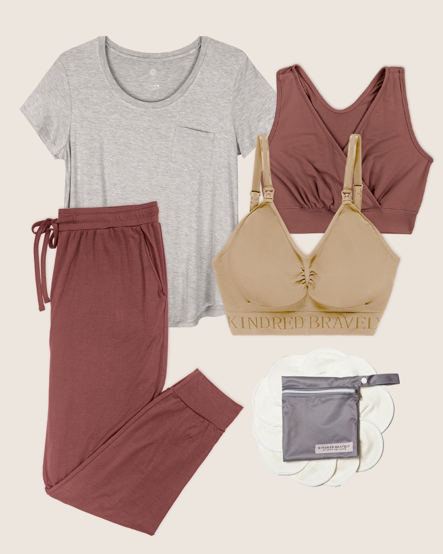 Flat lay image of the Simply Sublime Tank, Everyday Joggers, Everyday Maternity & Nursing T-shirt, French Terry Bra and Organic Bamboo Nursing Pads.