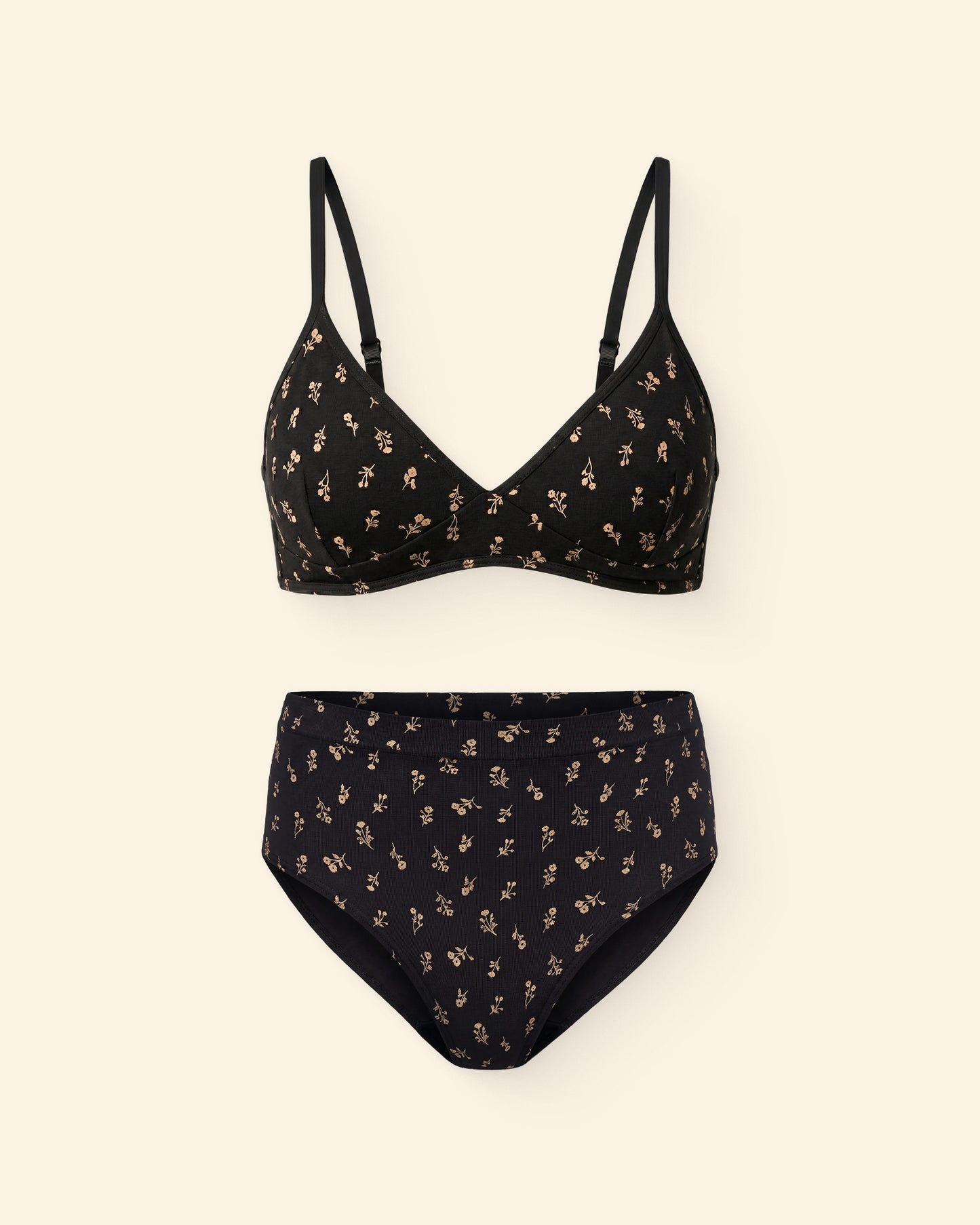 Every Stage Bra & Brief Set in Black Wildflower on a beige background