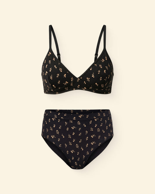 Every Stage Bra & Brief Set in Black Wildflower on a beige background