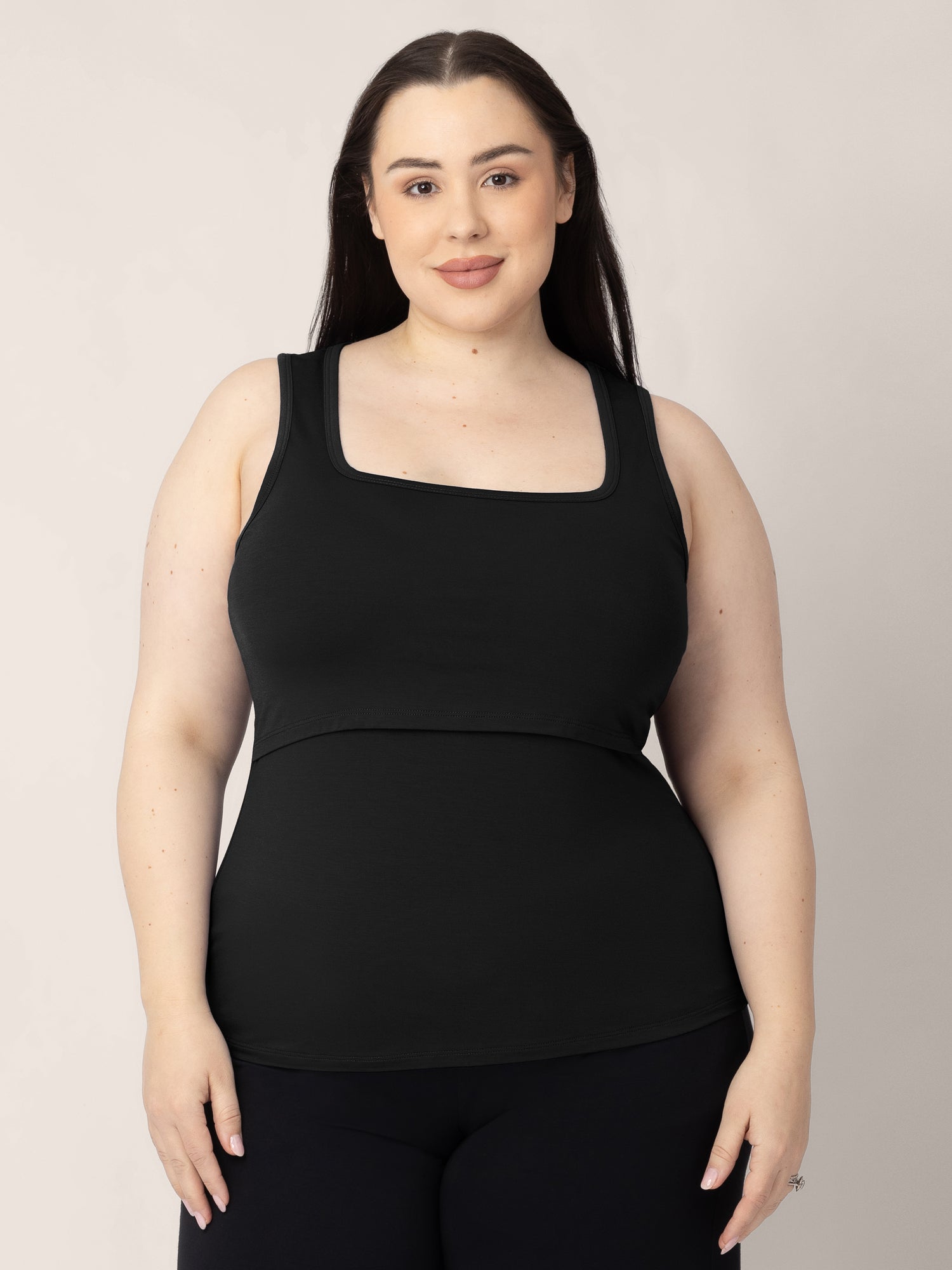 Model wearing the Everyday Essential Nursing Tank in Black