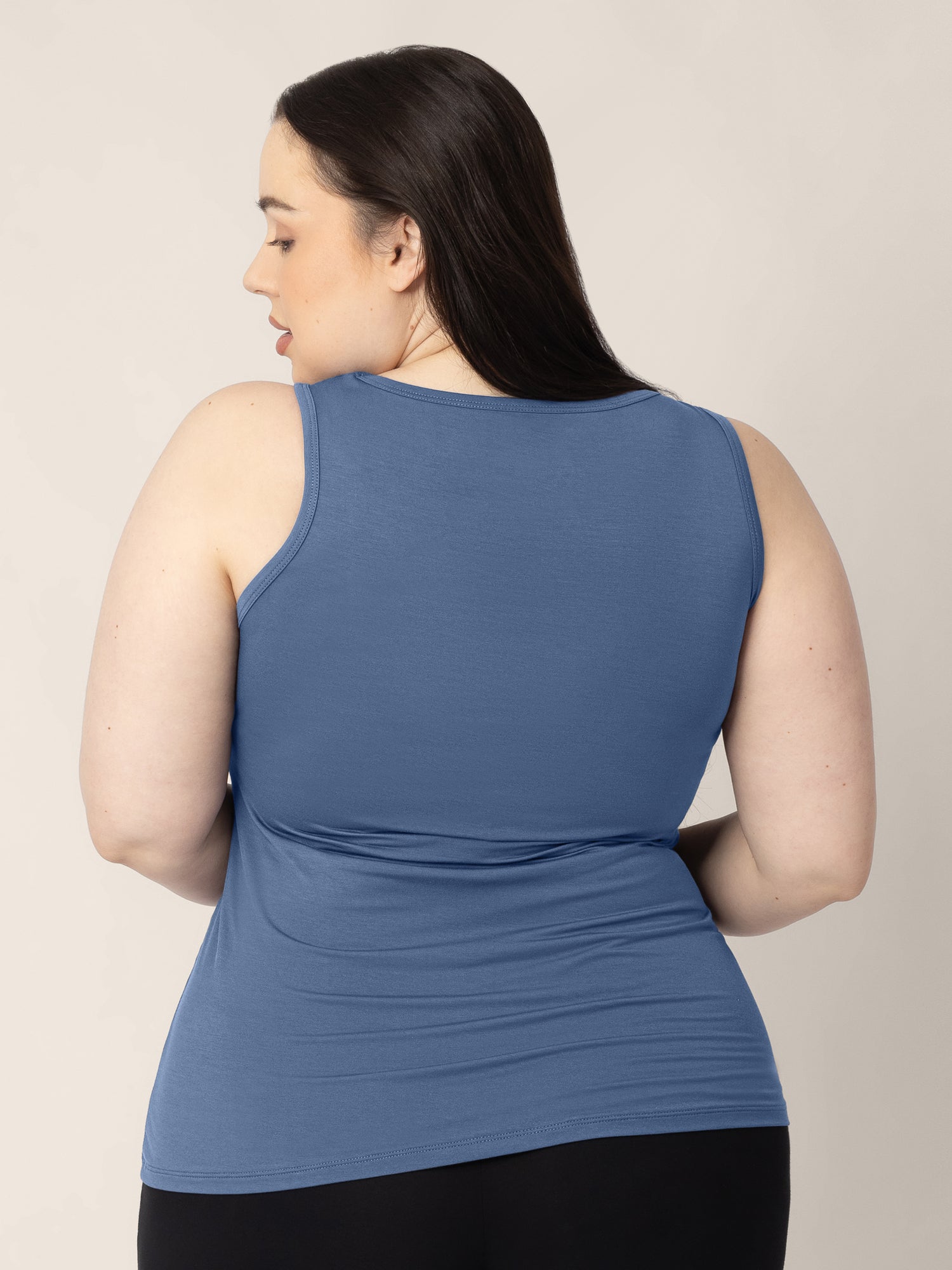 Back view of a model wearing the Everyday Essential Nursing Tank in Slate Blue 