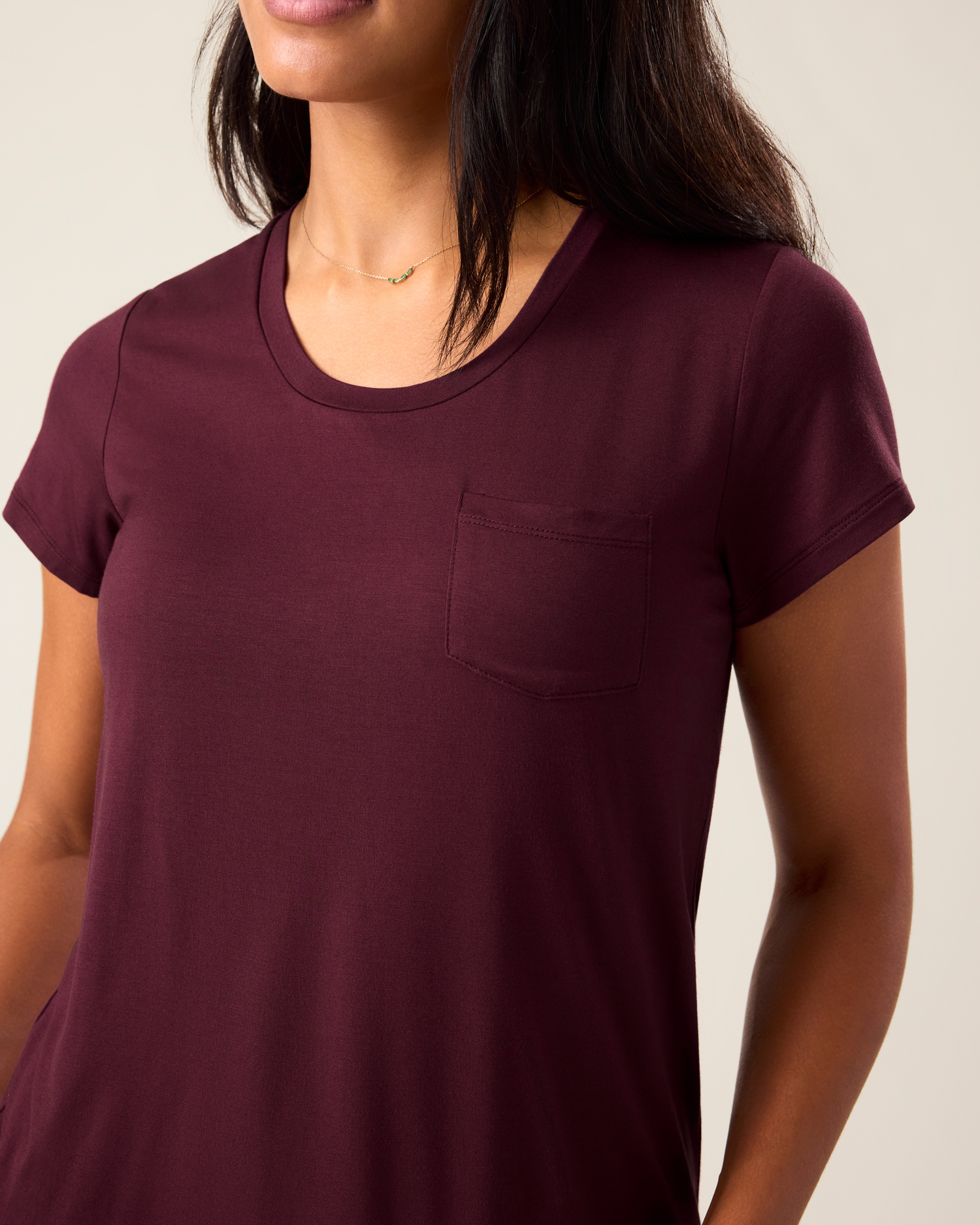 Woman wearing the Everyday Maternity & Nursing T-shirt in Deep Burgundy, showing neckline and pocket