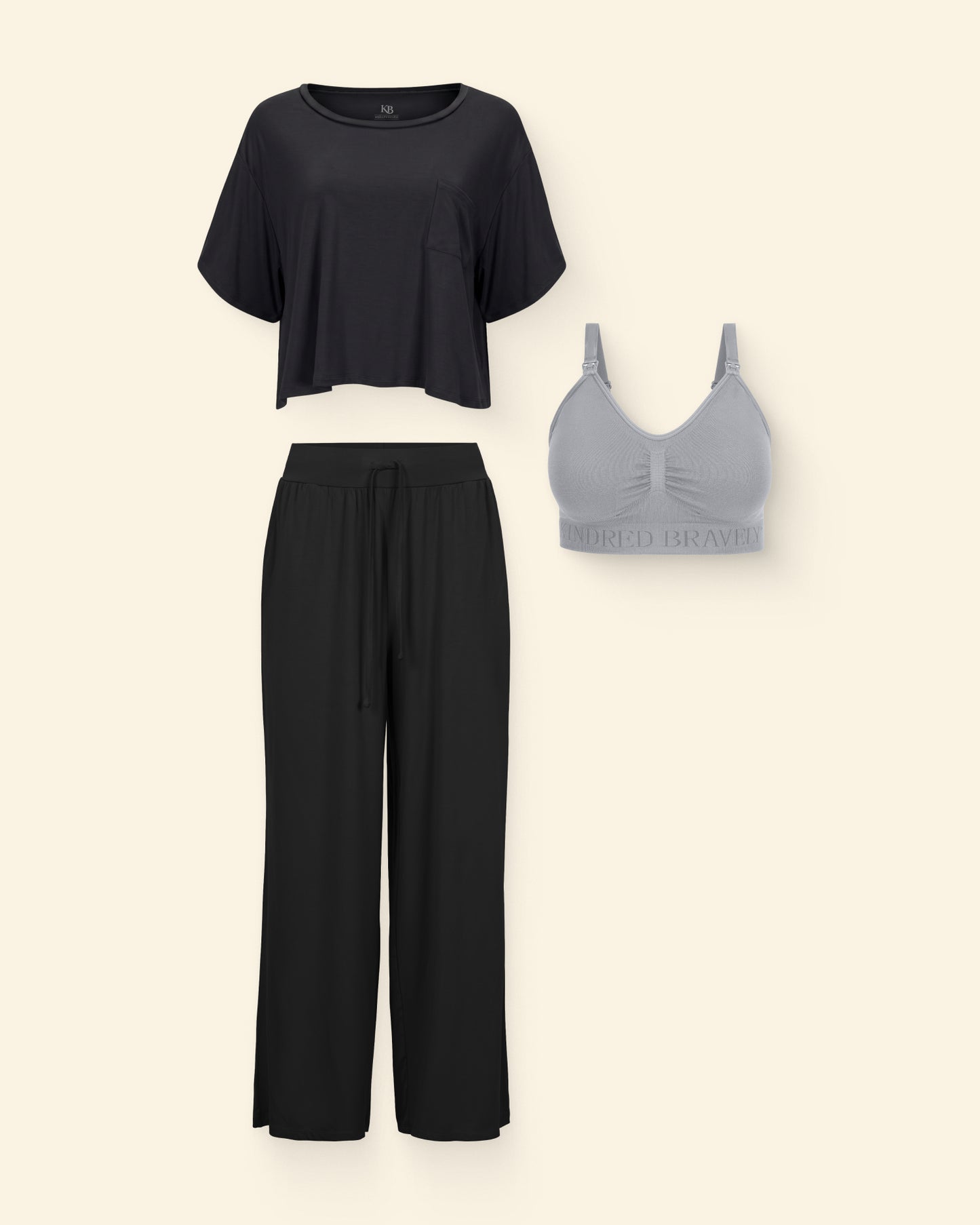 Fourth Trimester Set which includes: Simply Sublime® Nursing Bra in grey, Aria Bamboo Casual Cropped Short Sleeve Top in black and Wide-leg Aria Bamboo Casual Lounge Pant in black, on beige background