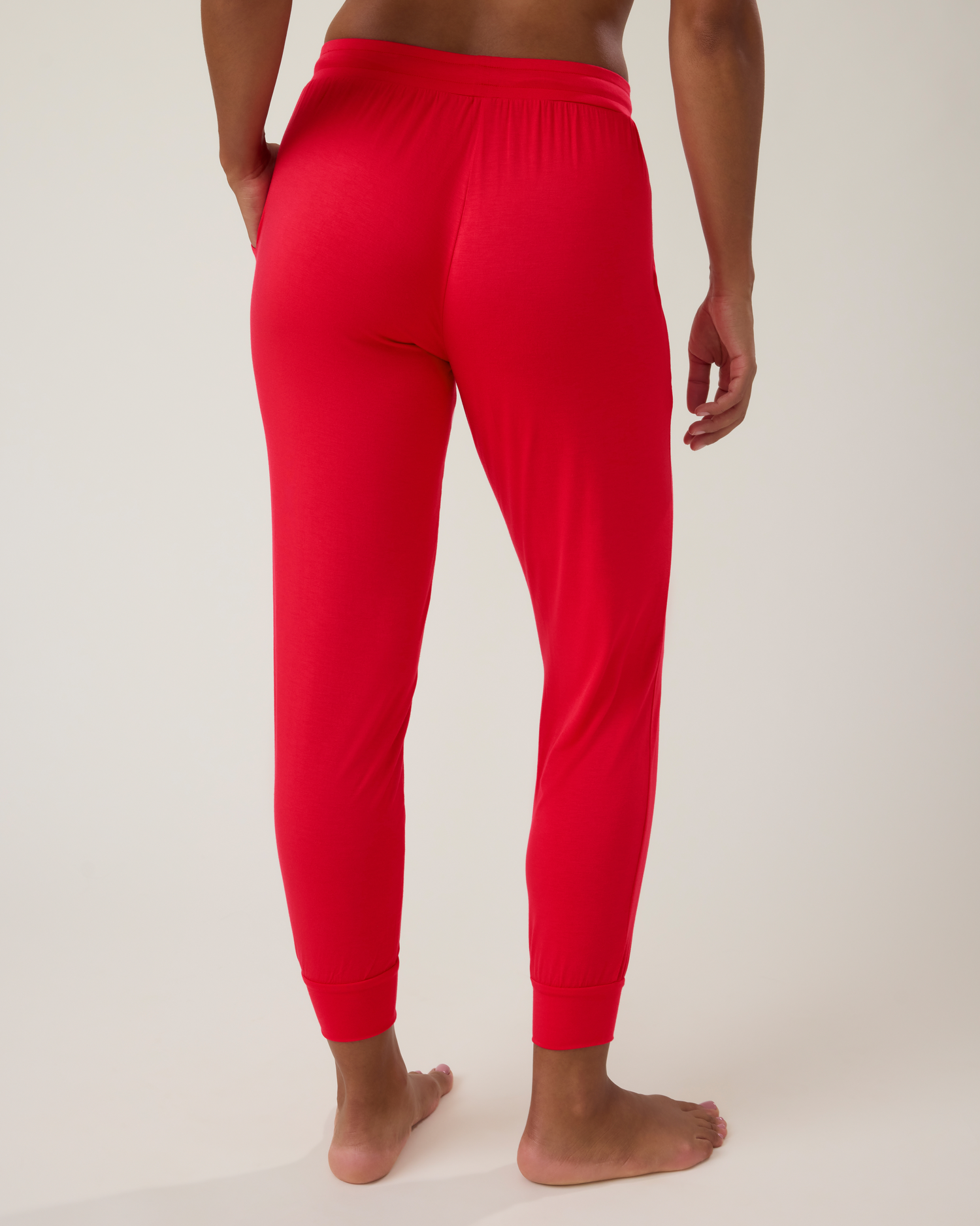 Back of woman wearing the Everyday Lounge Jogger in red