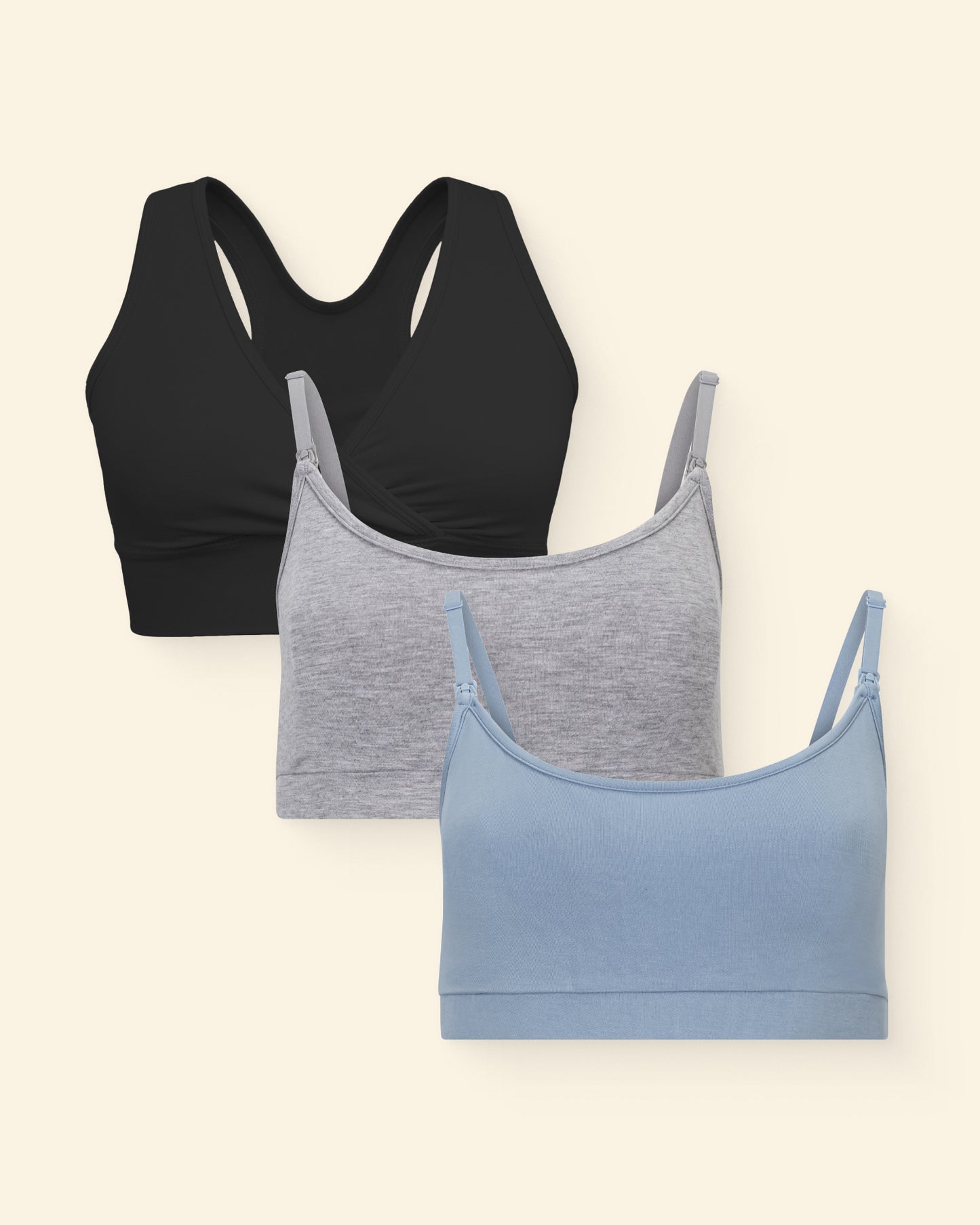 Three bralettes in black, gray, and blue on a beige background