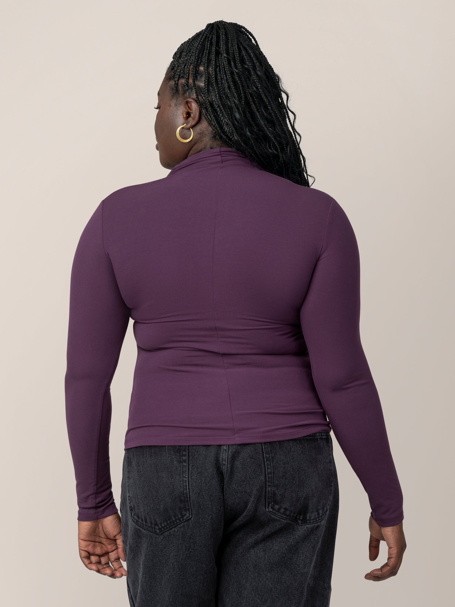 Back view of model wearing the Gianna Shirred Maternity & Nursing Top in Mulberry