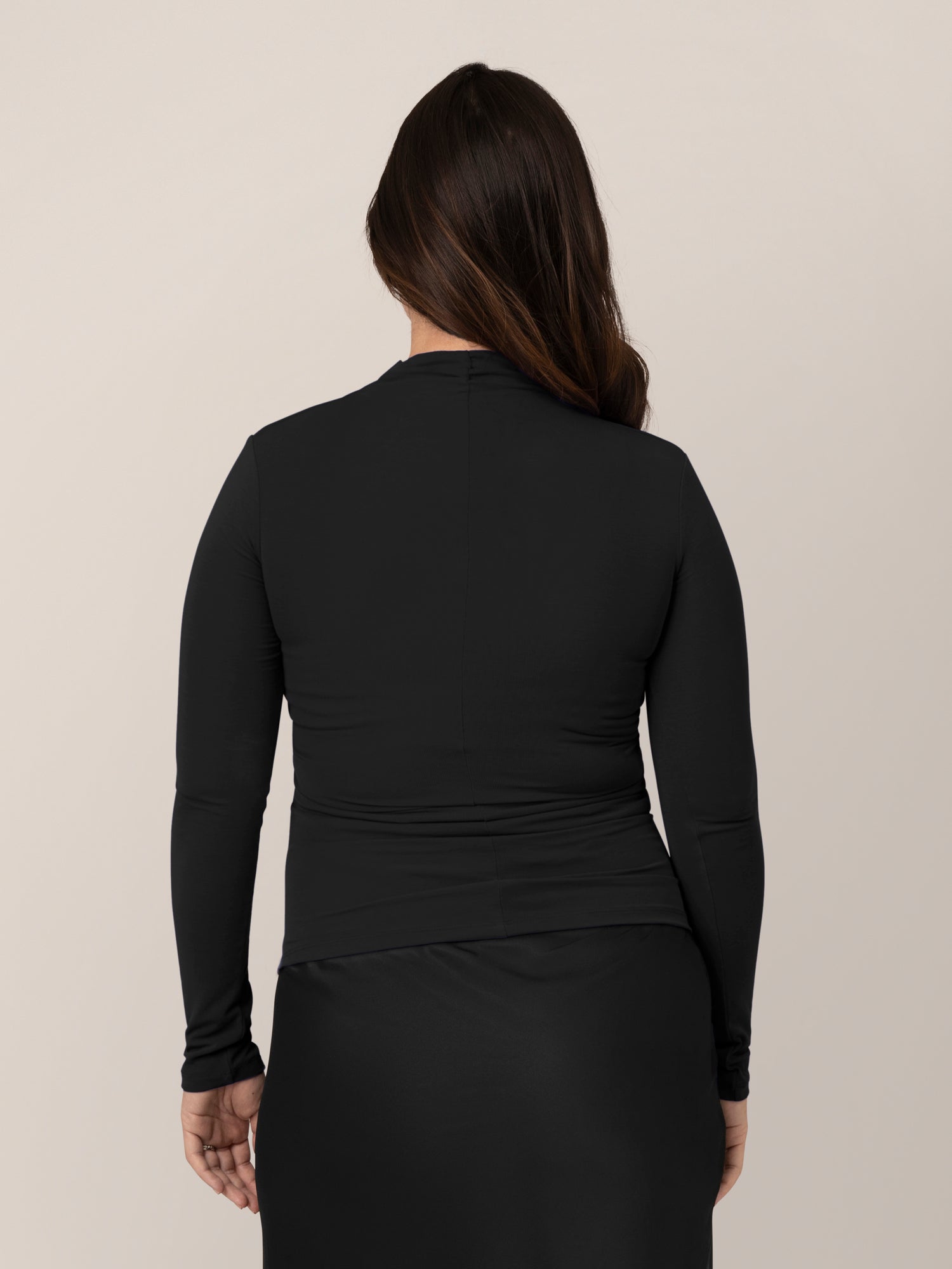 Back view of model wearing the Gianna Shirred Maternity & Nursing Top in Black