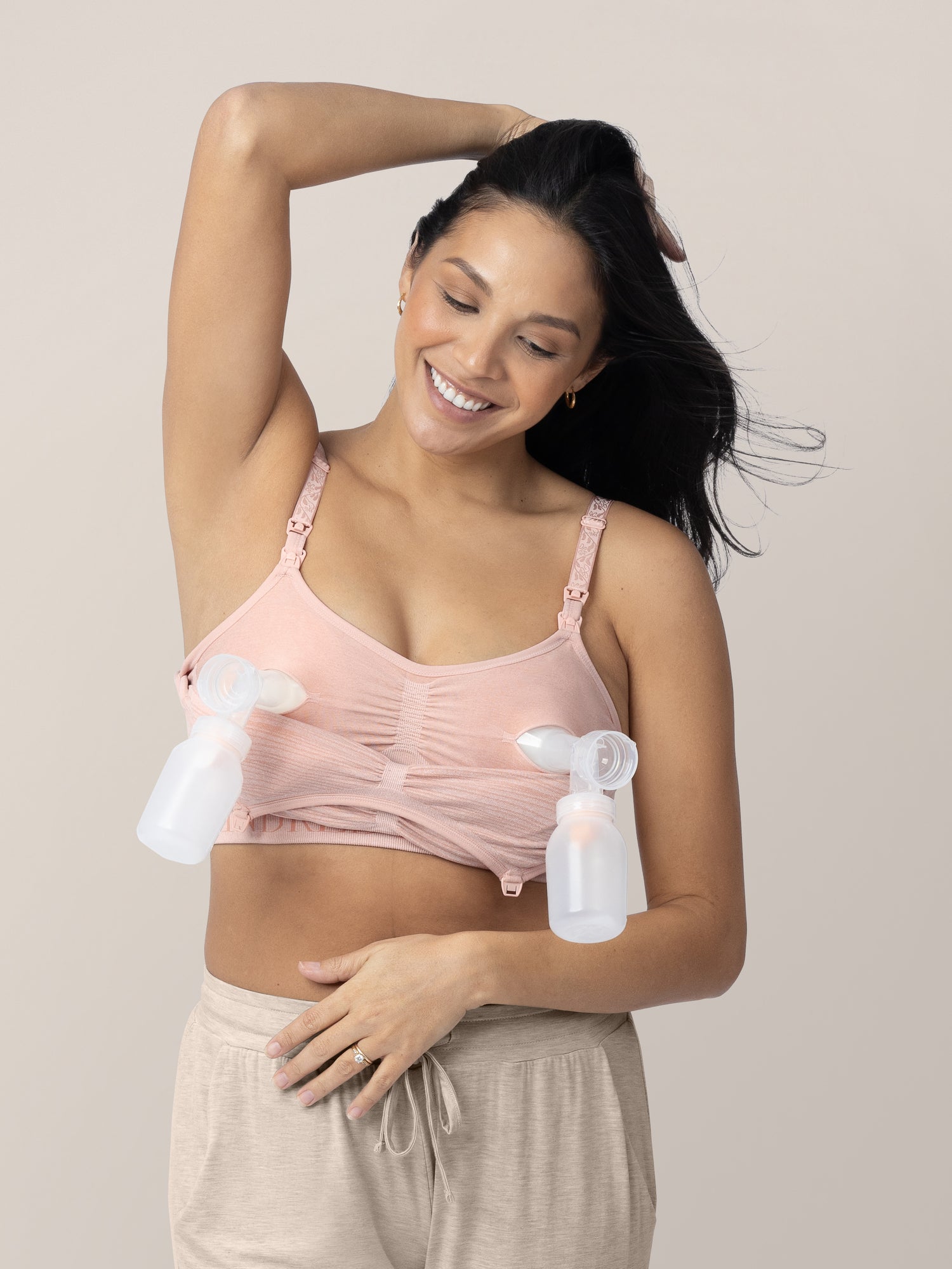 Model wearing the Hands-Free Pumping & Nursing Bra in Soft Pink
