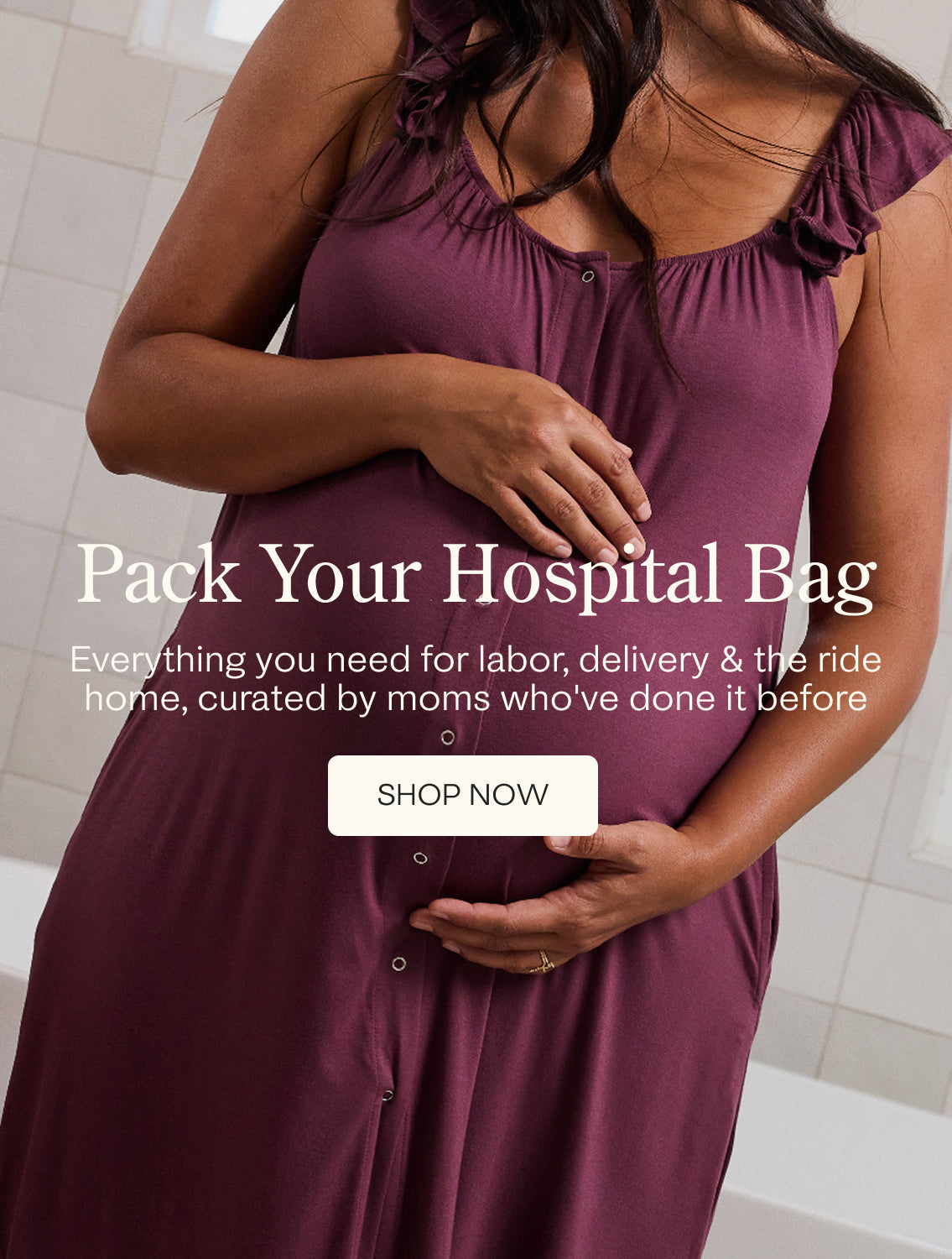 A pregnant woman in a Ruffle Labor & Delivery Gown stands in a bright bathroom, holding her baby bump. Text on the left reads 'Pack Your Hospital Bag' with a 'SHOP NOW' button, promoting hospital bag packing services curated by moms. Text reads, Everything you need for labor, delivery and the ride home, curated by moms who've done it before.