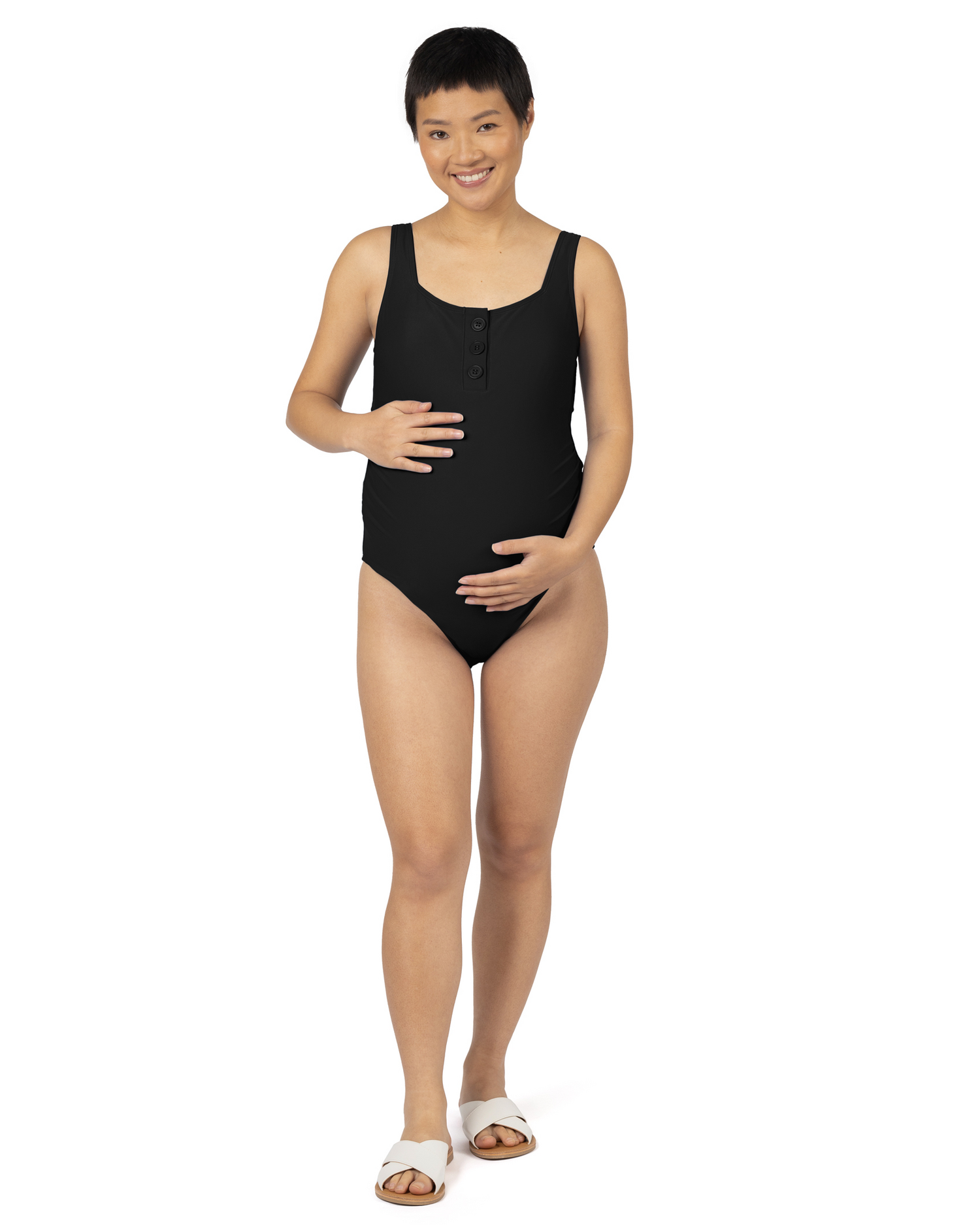 Model wearing the Henley Maternity One Piece Swimsuit in Black. 