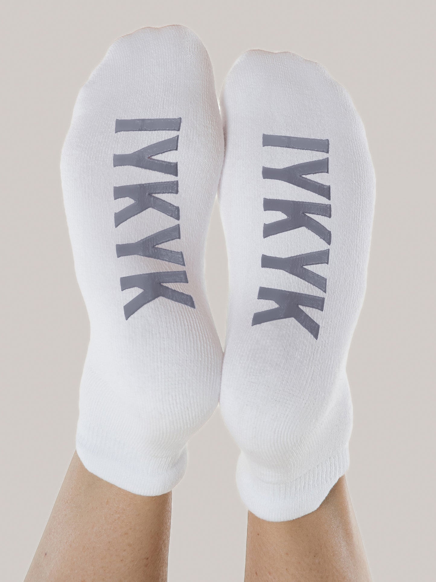 Labor & Delivery Socks with IYKYK printed at the bottom