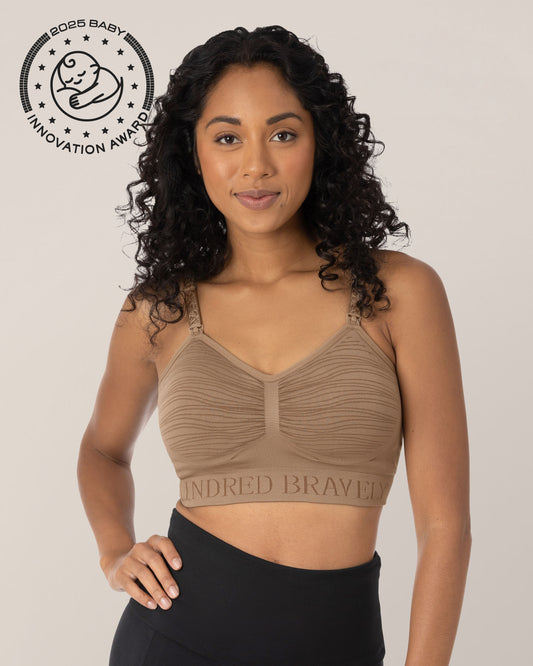 Model in the Sublime® Hands-Free Pumping & Nursing Bra in Latte, with one hand on her hip. @model_info:Anastacia is wearing a Small.