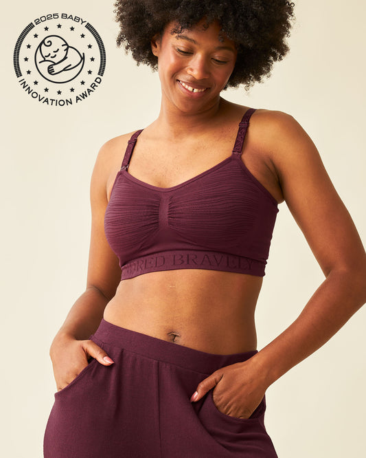Front view of model wearing Sublime® Hands-Free Pumping & Nursing Bra in Deep Burgundy @model_info:Kyra is wearing a Small.