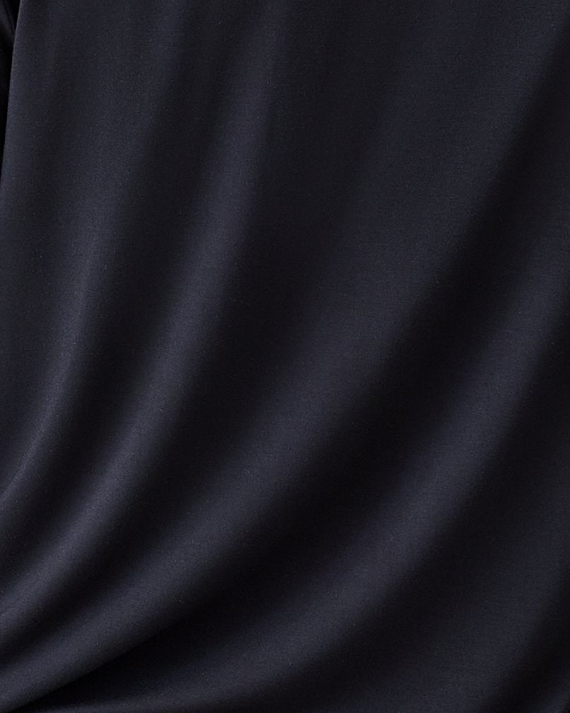 Close up of soft material on the Clea Bamboo Long Sleeve Pajama Set in Black. 