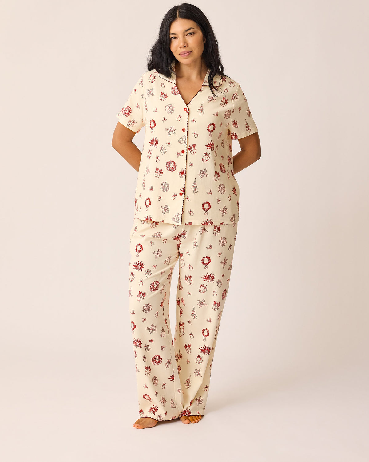 Model is wearing the Cotton Bamboo Pajama Set in Cozy Day pattern on a beige background. @model_info:Ashley is 5'7" and wearing a Medium.