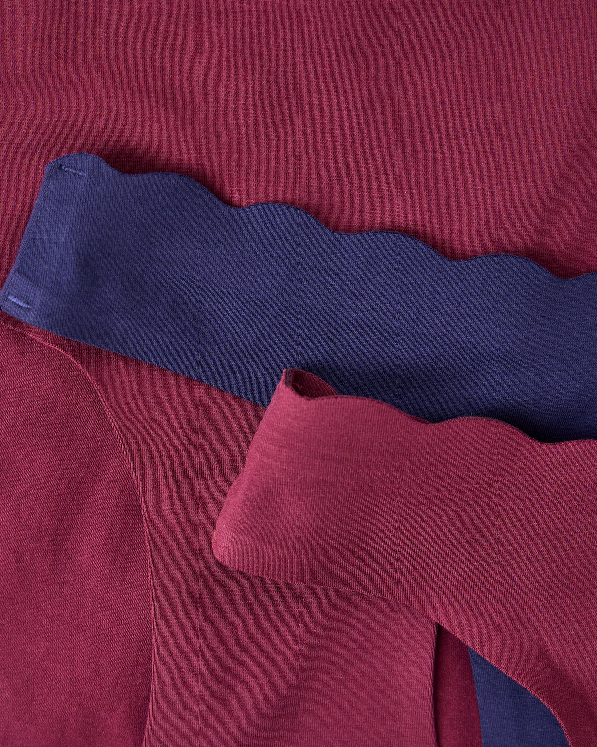 BareBond™ Cotton Maternity & Postpartum underwear in Coastal Navy and Garnet, layered  on one another.
