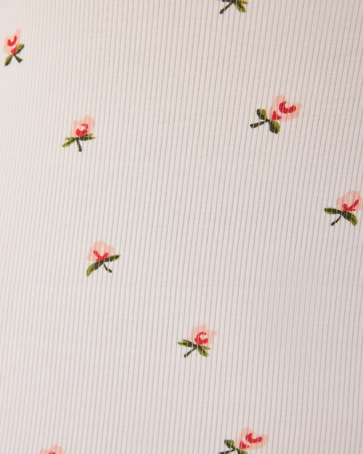 Close up of pattern on French Terry Racerback Tank in Ivory Wildflower.