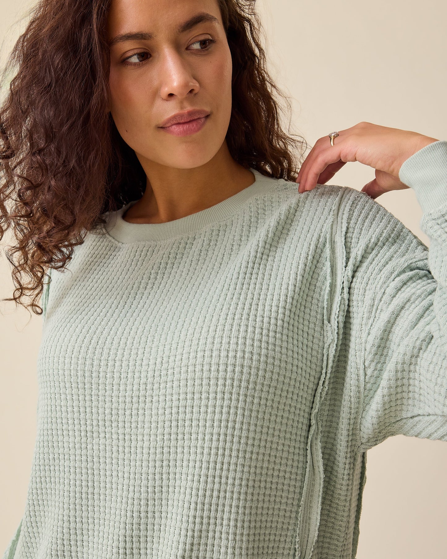 Model is wearing the Joelle Thermal Maternity & Nursing Top in Aqua Mist on a beige background.