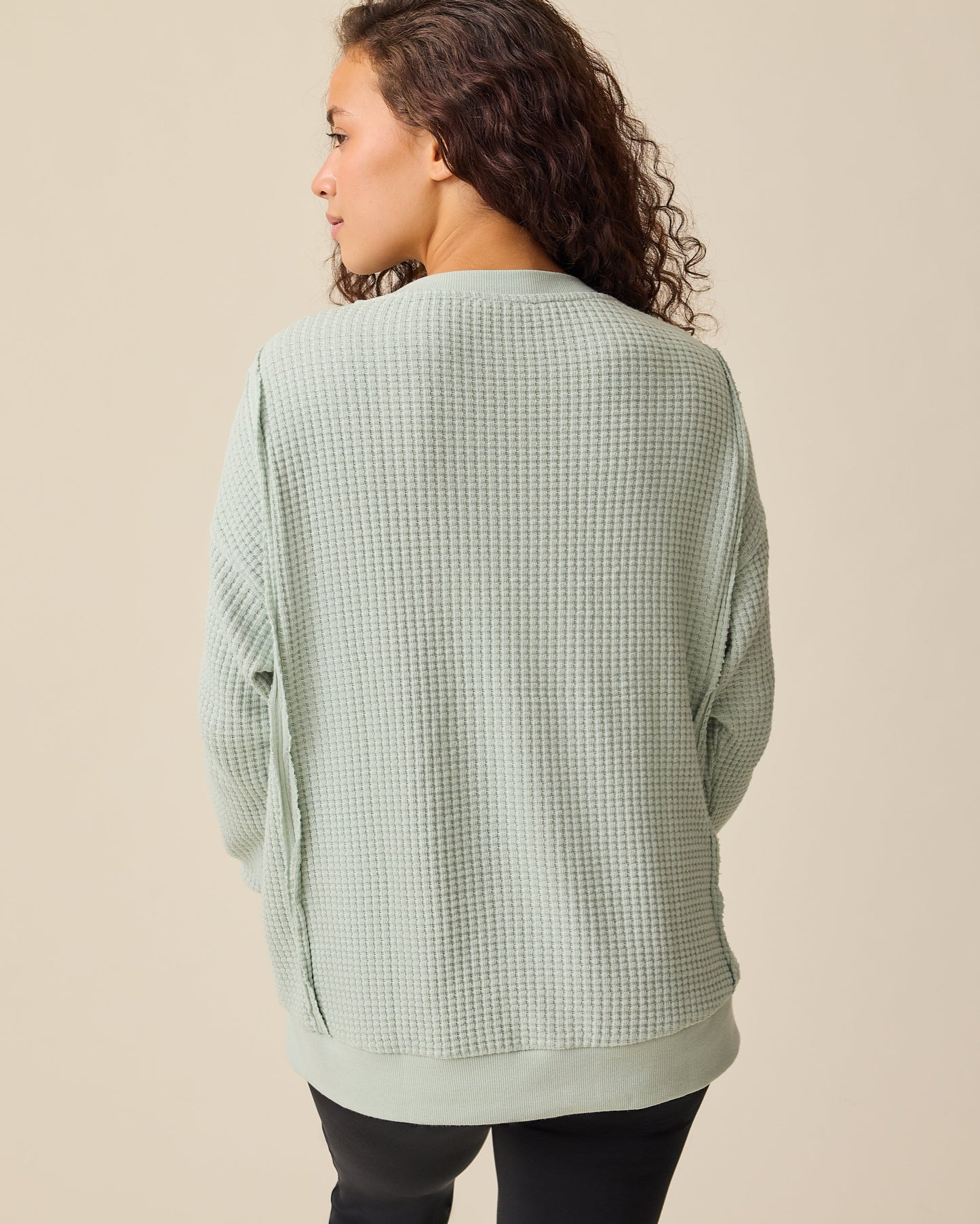 Back view of model wearing the Joelle Thermal Maternity & Nursing Top in Aqua Mist on a beige background.