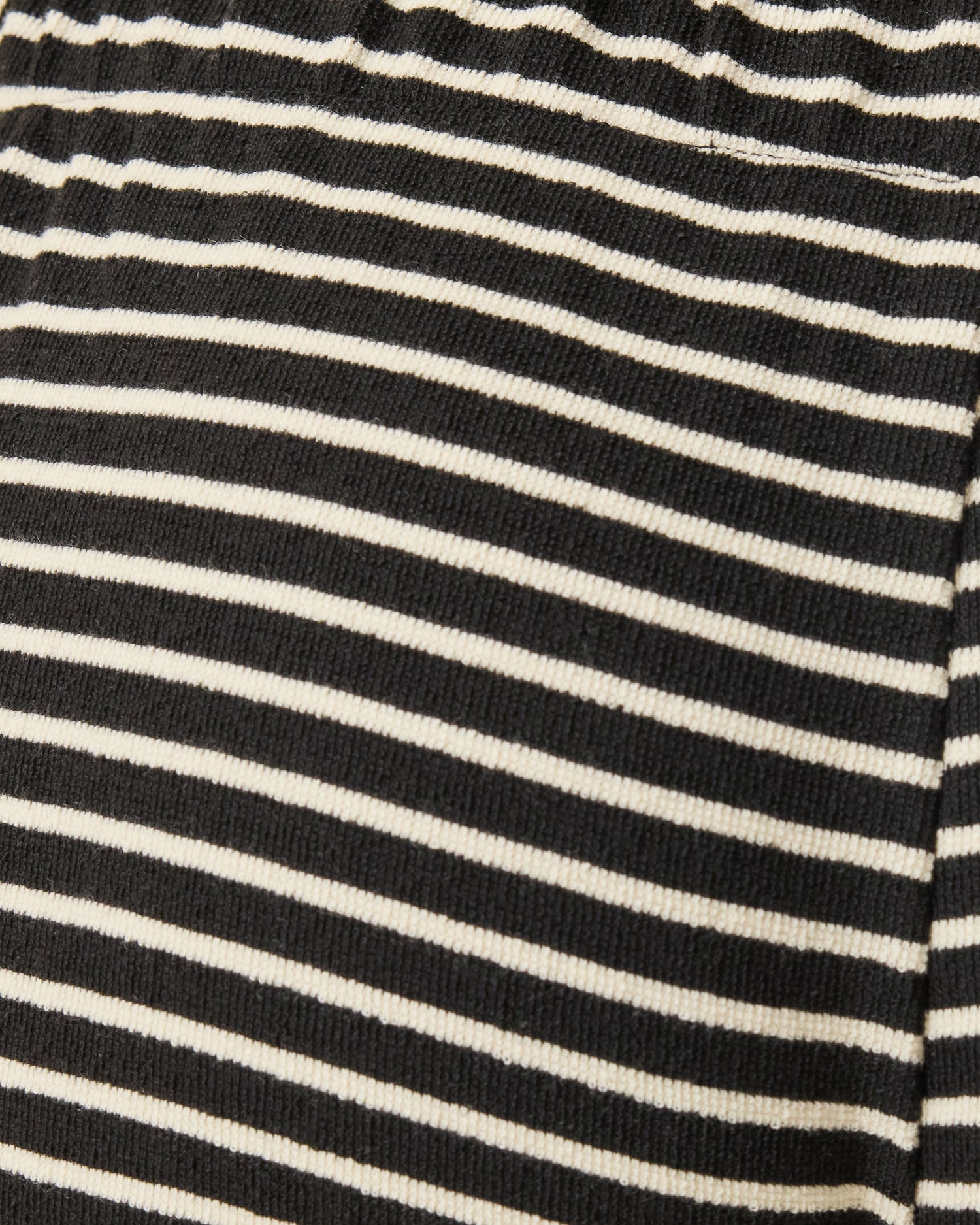 Close up of Luxe Terry Maternity & Postpartum Pant in Black & Ivory Stripe pattern.