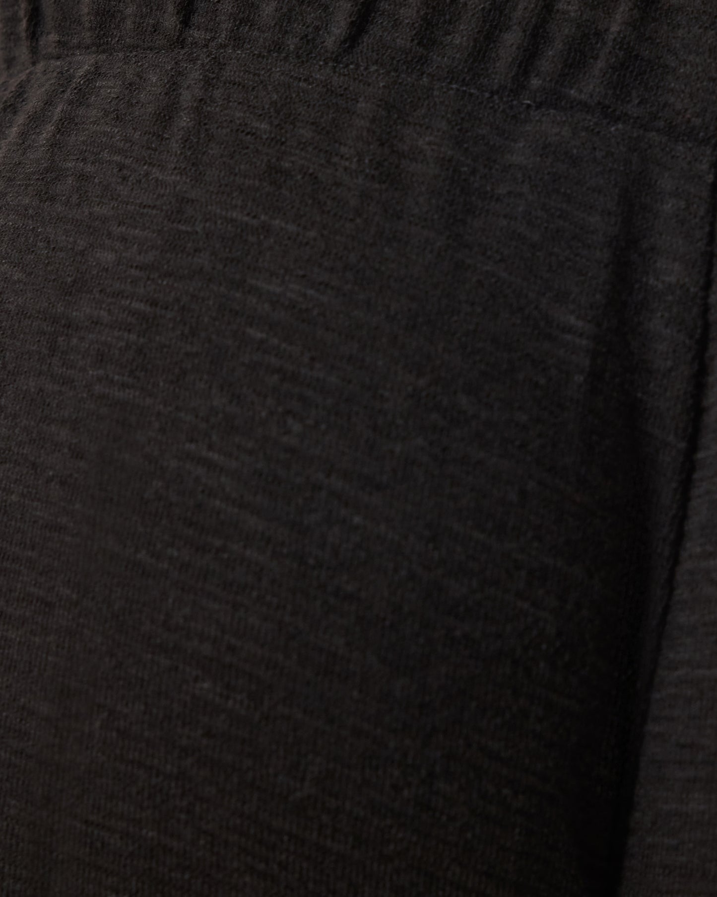 Close up of soft material on Luxe Terry Maternity & Postpartum Pant in Black.