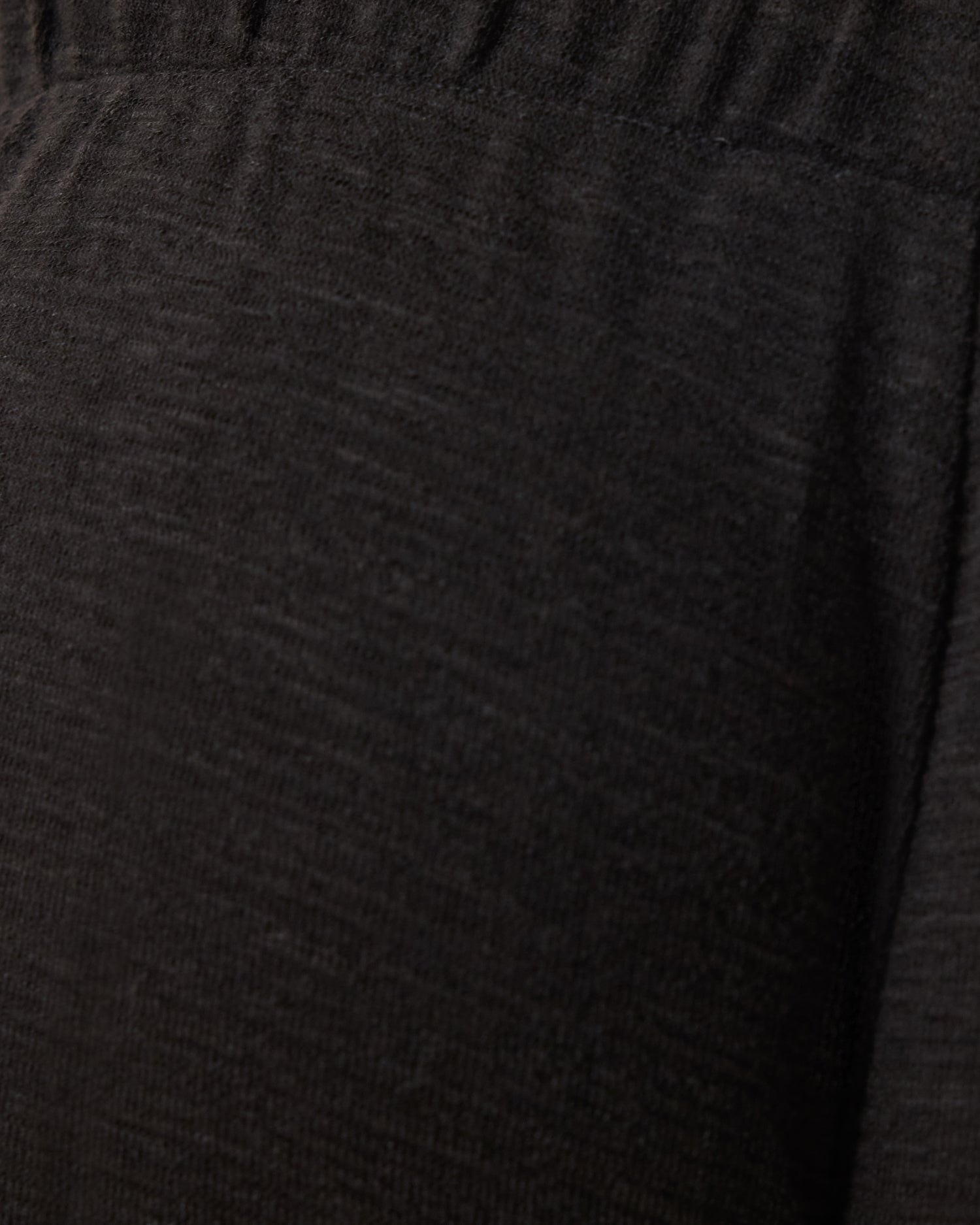 Close up of soft material on Luxe Terry Maternity & Postpartum Pant in Black.