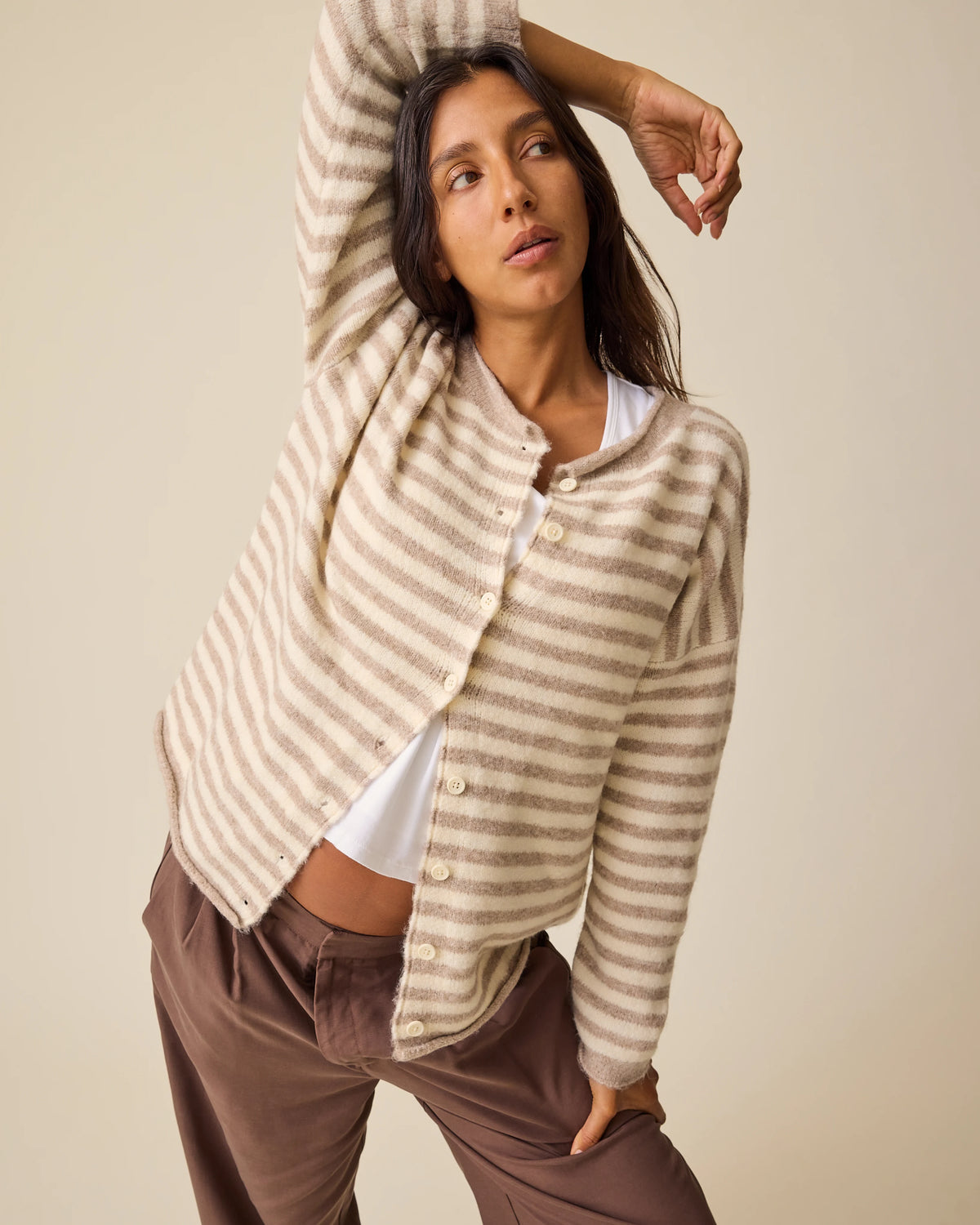Model is wearing Ultra Soft Maternity & Postpartum Cardigan in Tan & White Stripe, Maternity & Postpartum Wide Leg Trouser in Brown and a nursing white tee, on a beige background.@model_info:Hayley is wearing a Small.