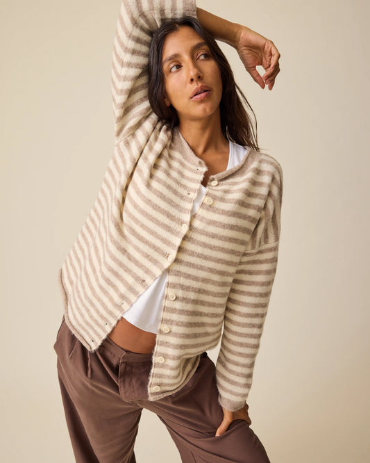 Model is wearing Ultra Soft Maternity & Postpartum Cardigan in Tan & White Stripe, Maternity & Postpartum Wide Leg Trouser in Brown and a nursing white tee, on a beige background.@model_info:Hayley is wearing a Small.