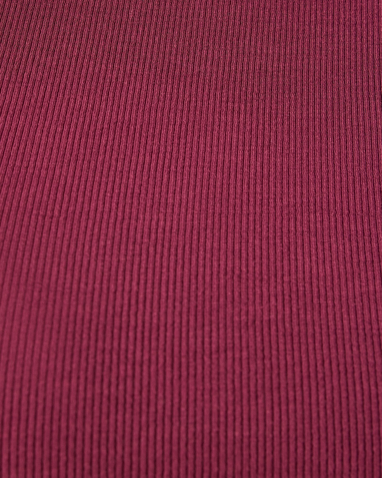Close up of ribbed texture on the Ribbed Bamboo Crew Neck Nursing T-shirt in Deep Burgundy.