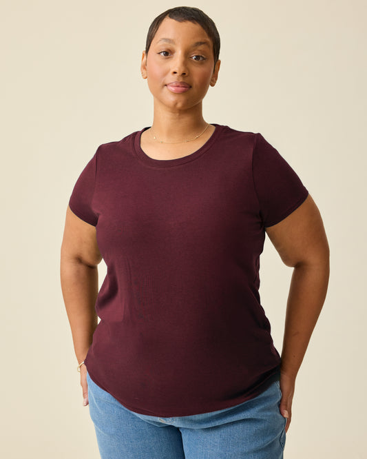 Model is wearing Modal Crew Neck Nursing T-shirt in Deep Burgundy on a beige background. @model_info:Brittany is wearing an X-Large.