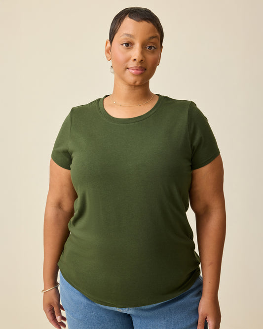 Model is wearing Modal Crew Neck Nursing T-shirt in Deep Olive, on a beige background.@model_info:Brittany is wearing an X-Large.